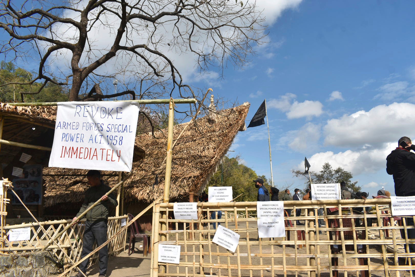 Placards calling for revocation of the Armed Forces (Special Powers) Act at the Hornbill festival in Nagaland, following the killing of civilians by Indian soldiers in the state, December 5, 2021. 
