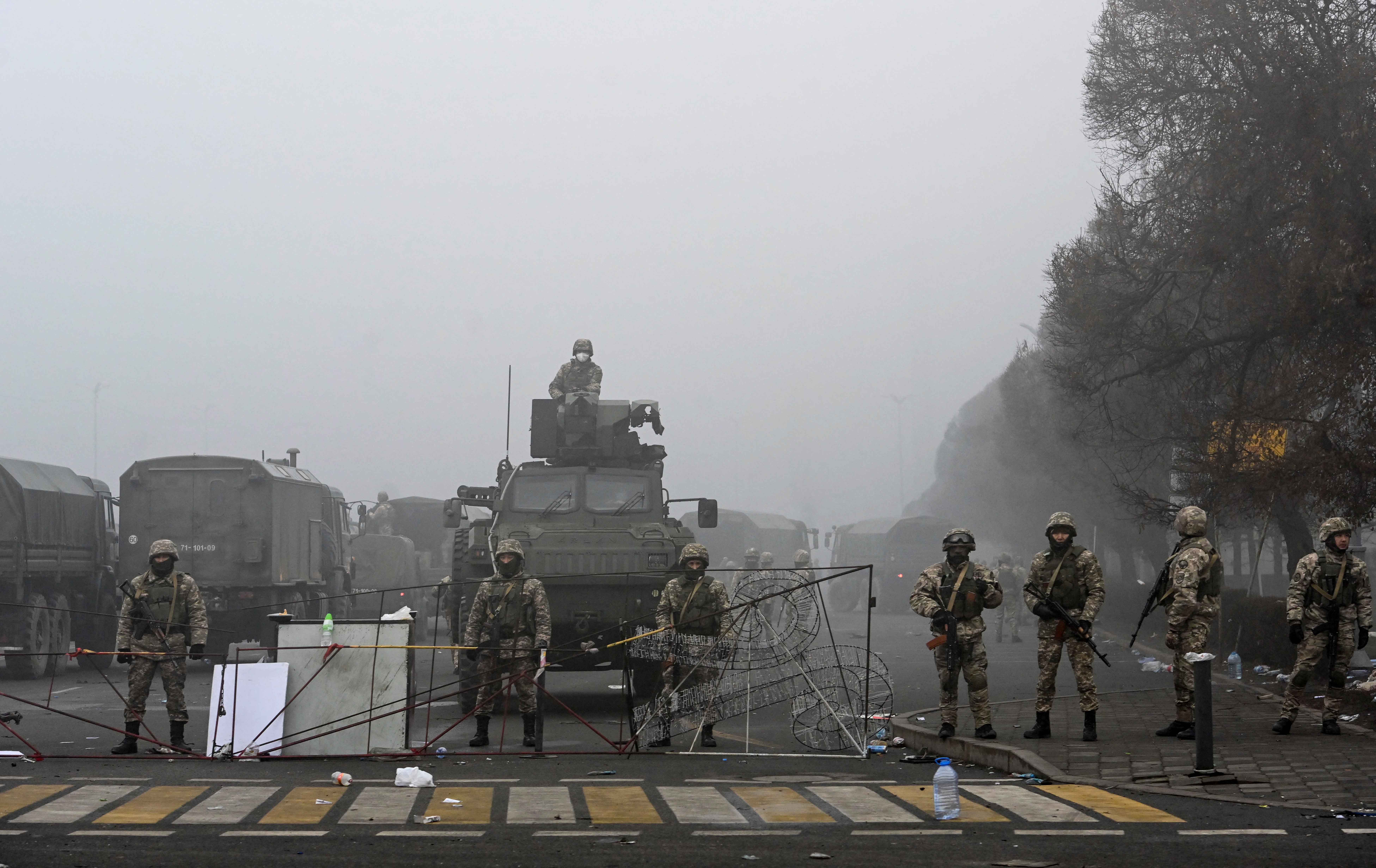 Troops are seen at the main square in Almaty, Kazakhstan where hundreds of people were protesting against the government, after authorities' decision to lift price caps on liquefied petroleum gas, January 6, 2022.