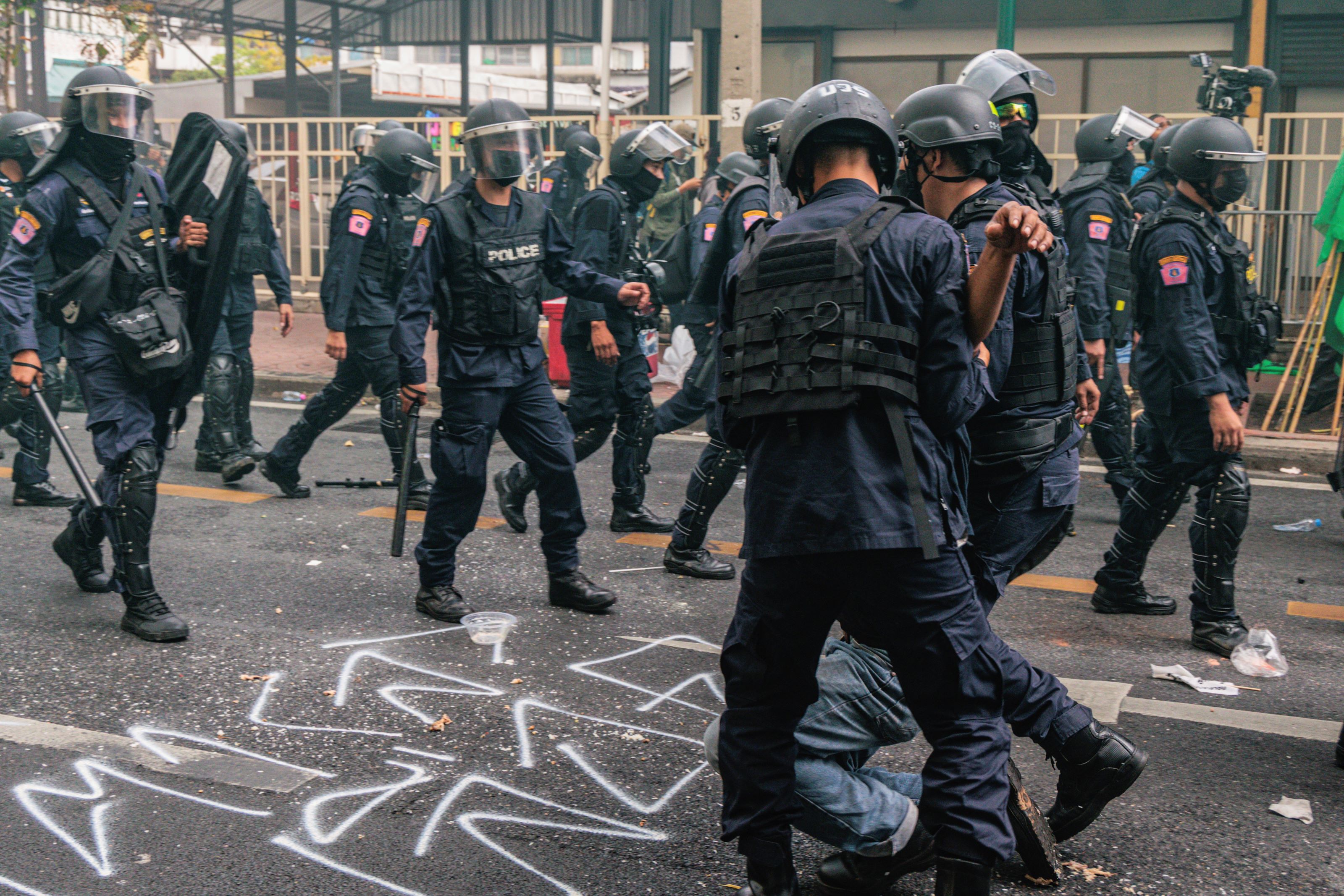 Police remove protesters trying to march