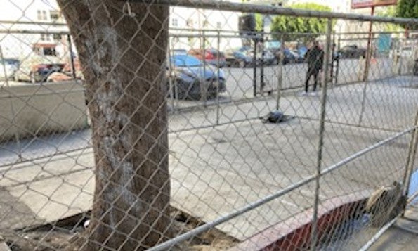 Fence on a sidewalk