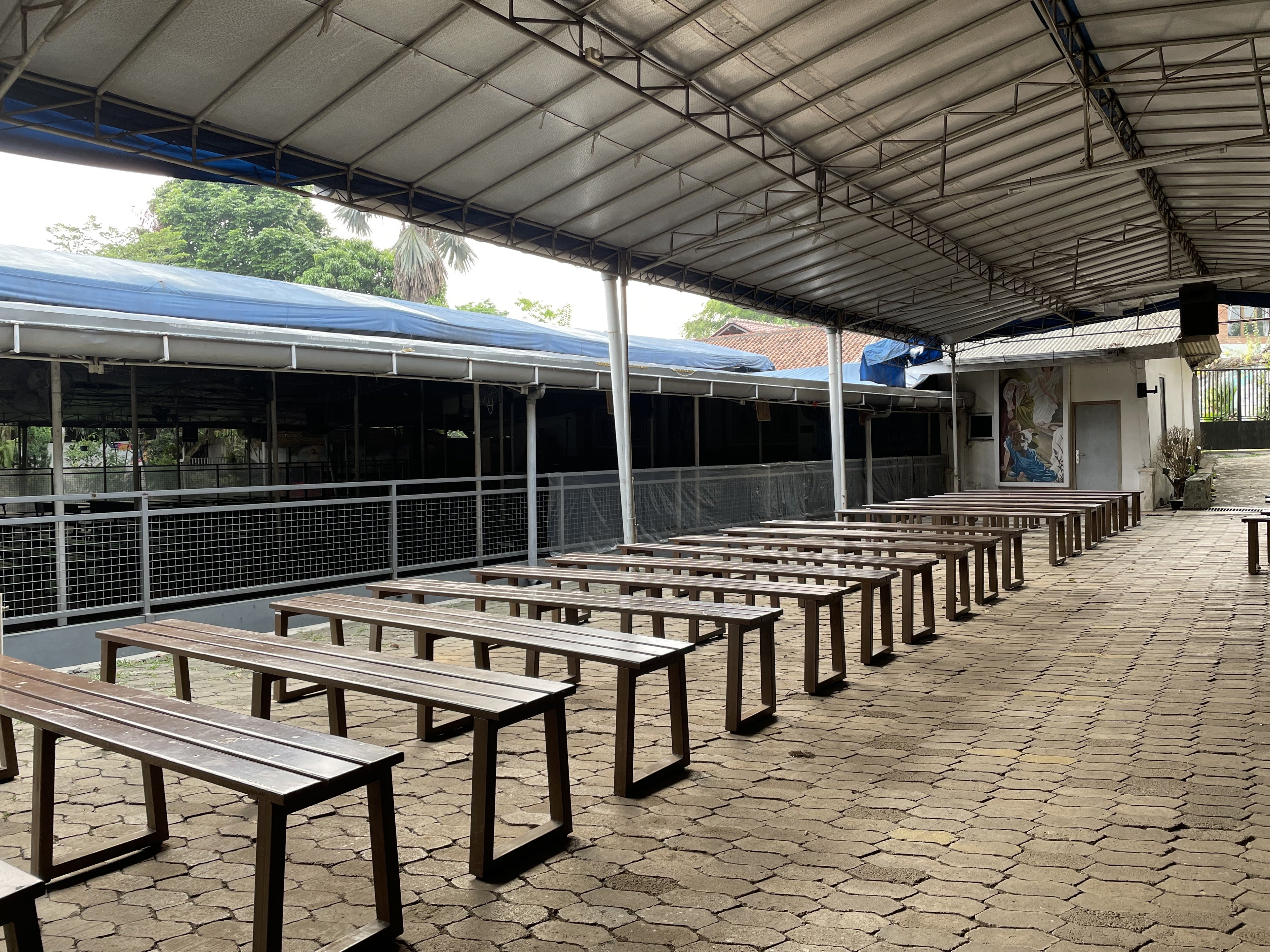 The parish of St. Joannes Baptista in Parung, near Jakarta, Indonesia, using tents for their services. It has not secured a church permit after applying for more than two decades.