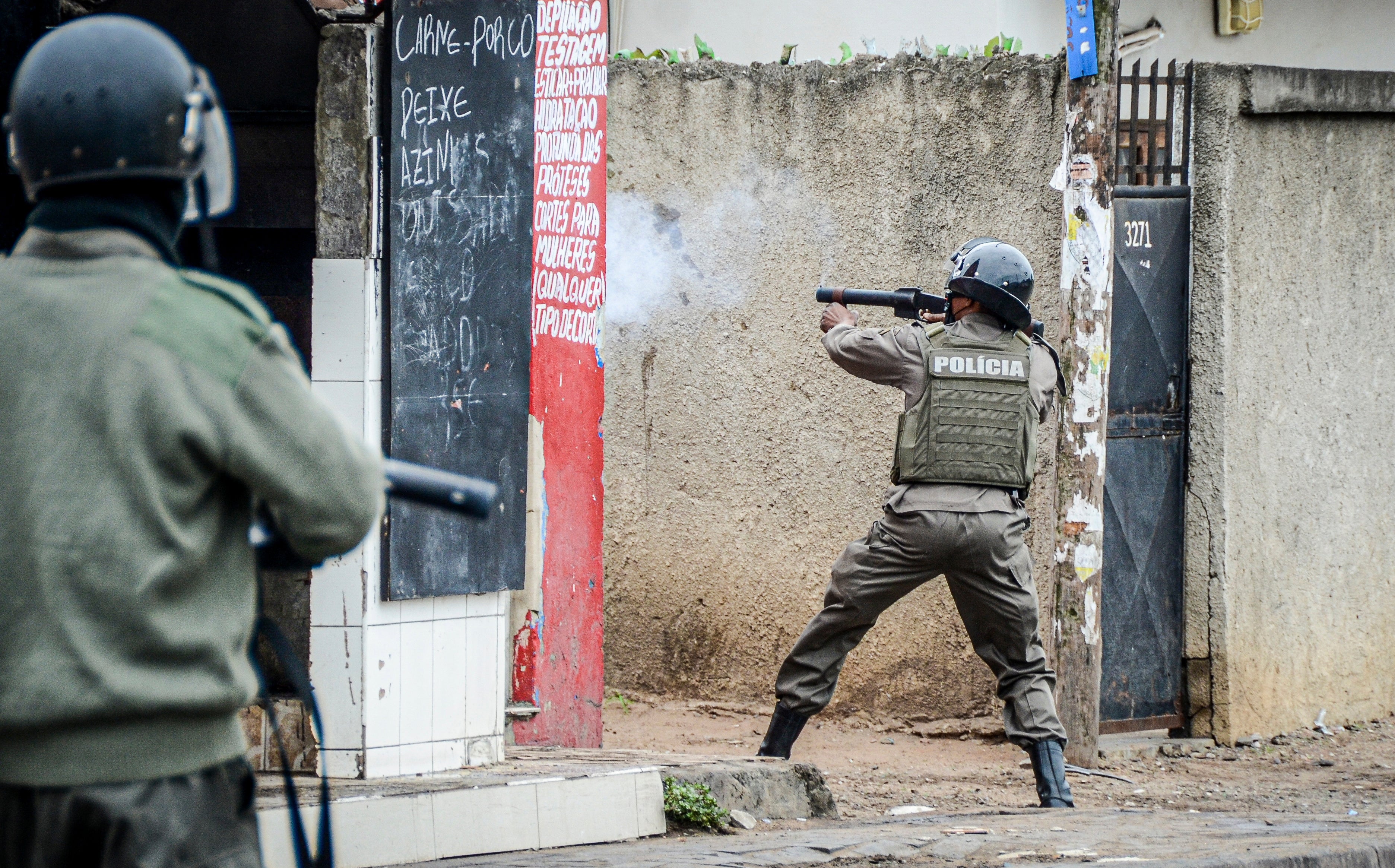 Mozambique police fire on protesters