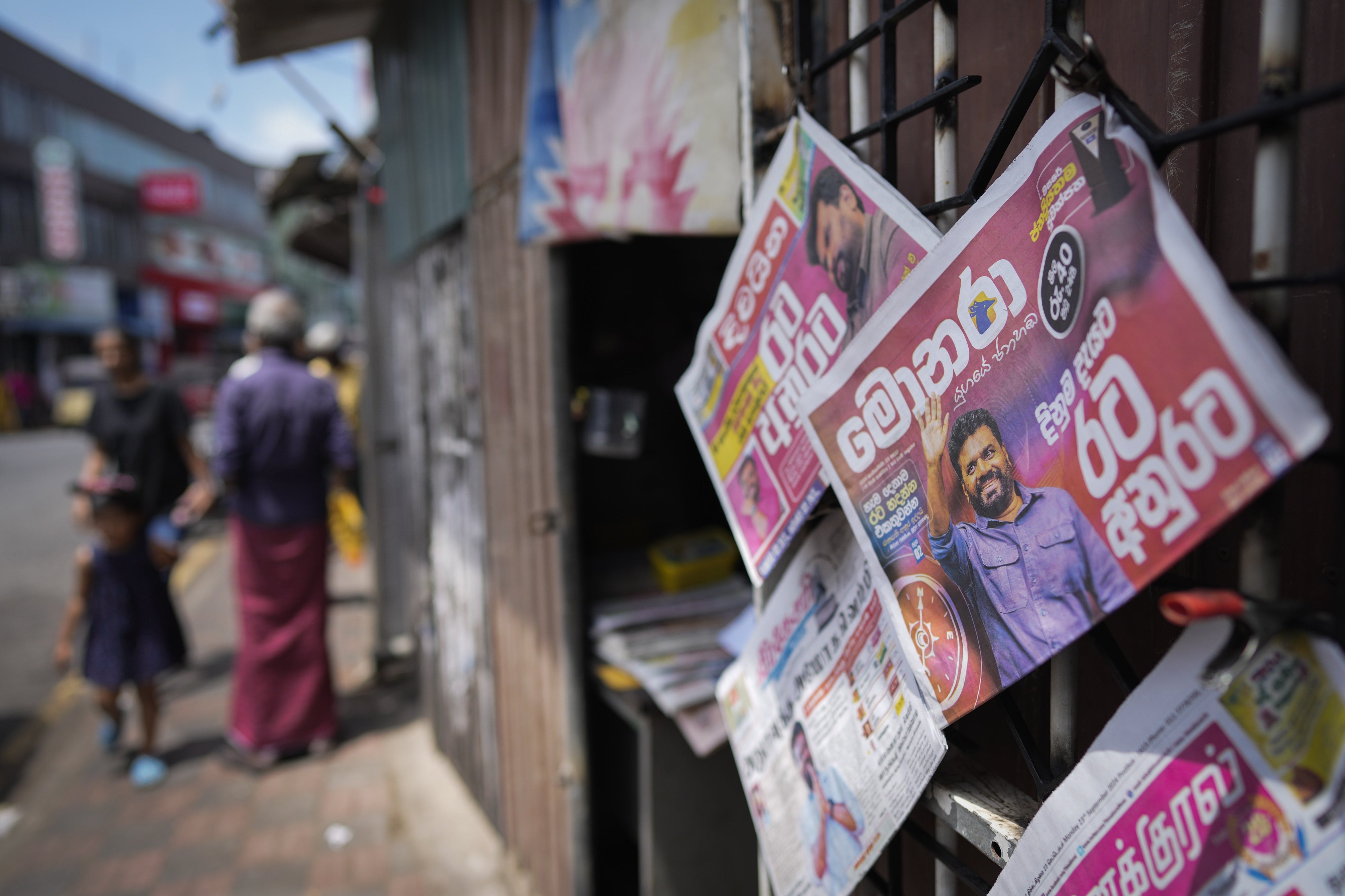 Newspaper front pages featuring Sri Lankan president-elect Anura Kumara Dissanayake.