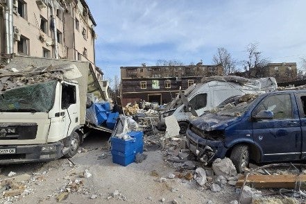 Cars under rubble 
