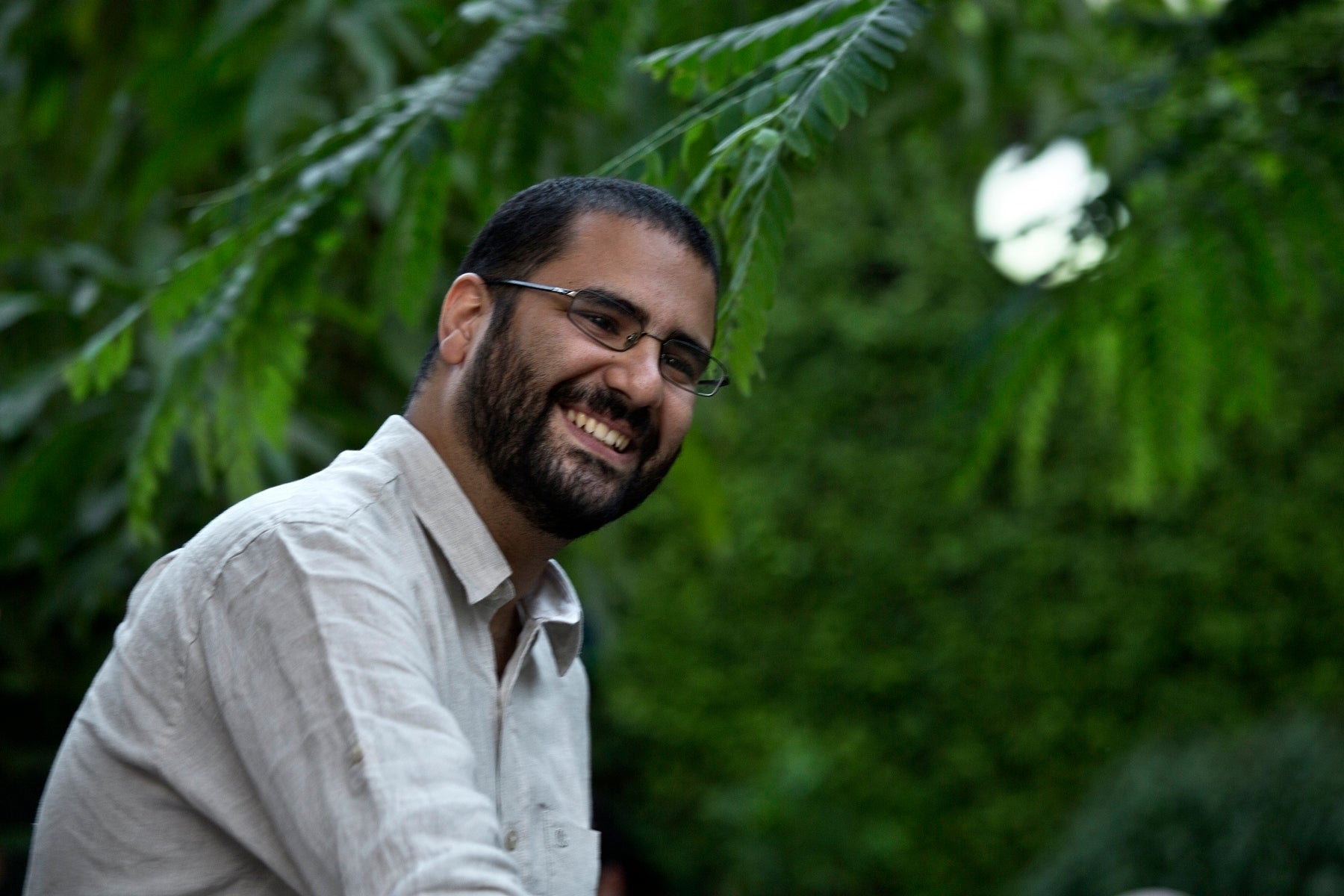 A man smiling in a photo