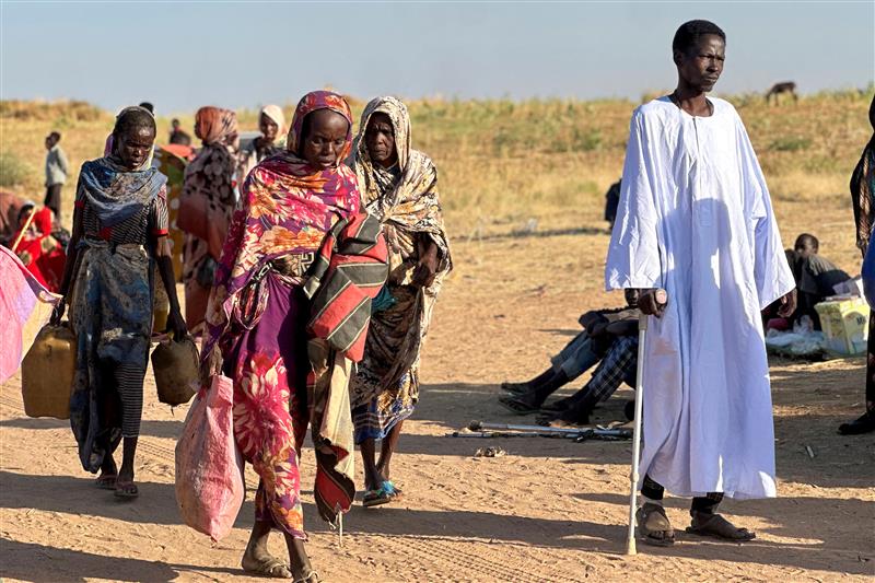 Displaced Sudanese people who fled El-Fasher after the city fell to the Rapid Support Forces (RSF) arrive in the town of Tawila, North Darfur, Sudan, on October 28, 2025.