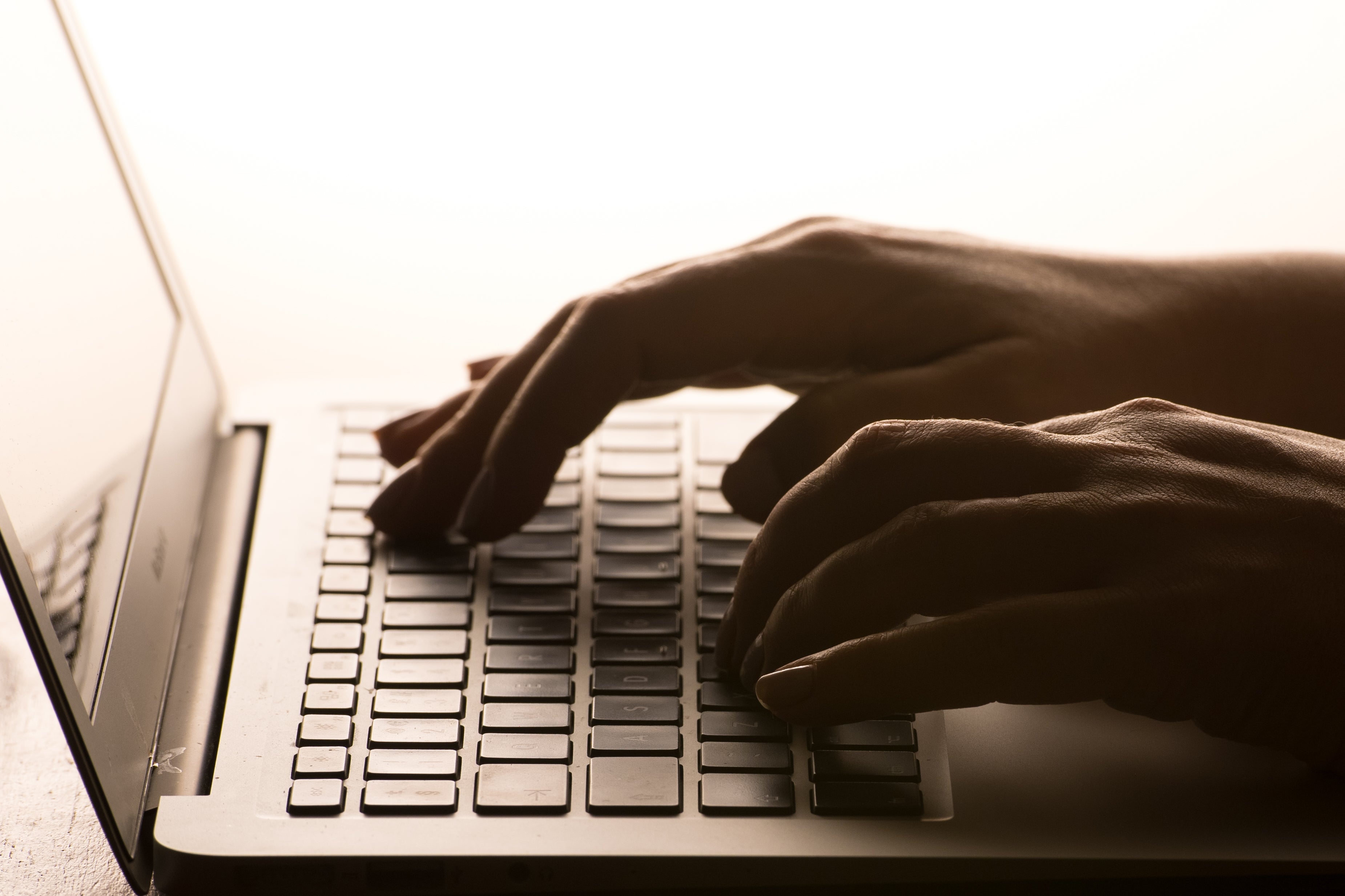  A person at the keyboard.