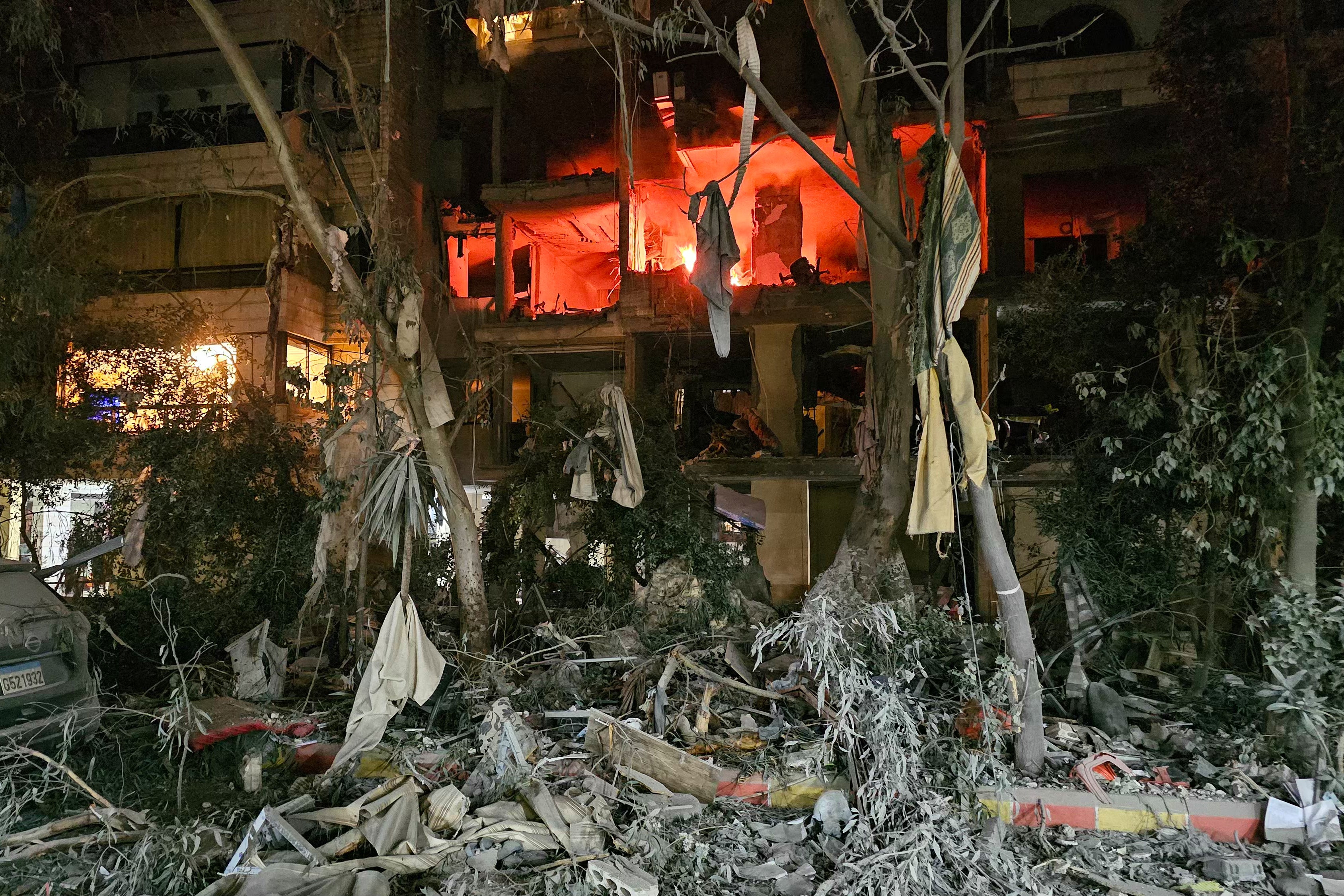 A damaged building is on fire after an Israeli airstrike in Beirut's southern suburb of Haret  Hreik, March 2, 2026.