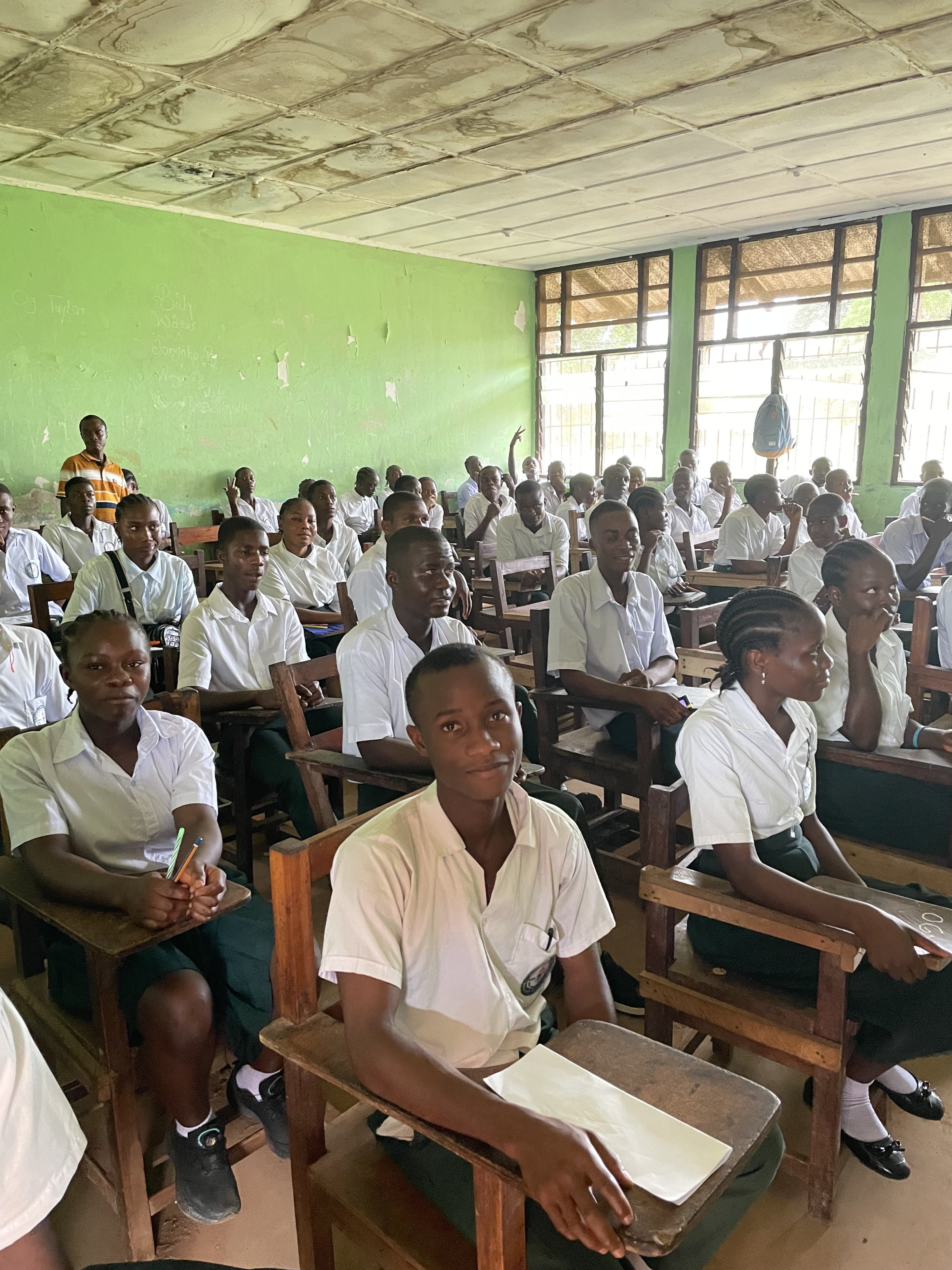 Students seated at their desks in a classroom