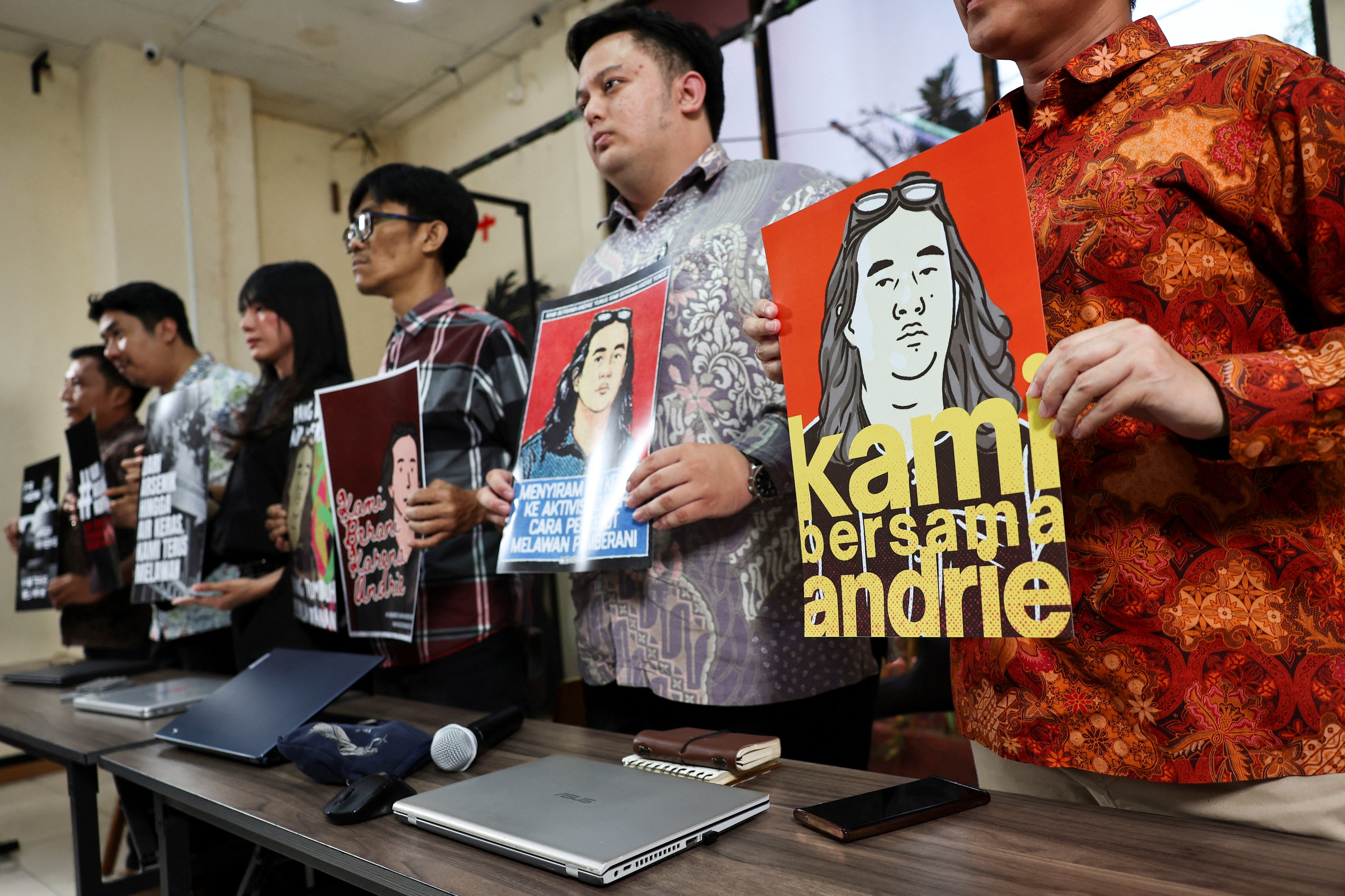 Advocacy for Democracy Team (TAUD) members show solidarity with Andrie Yunus, a rights who suffered burns in an acid attack in Jakarta, Indonesia, March 16, 2026.