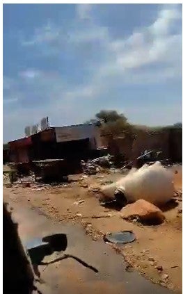 Stills from a video showing a Spanish-speaking PMC driving through the devastation of Zamzam displacement camp