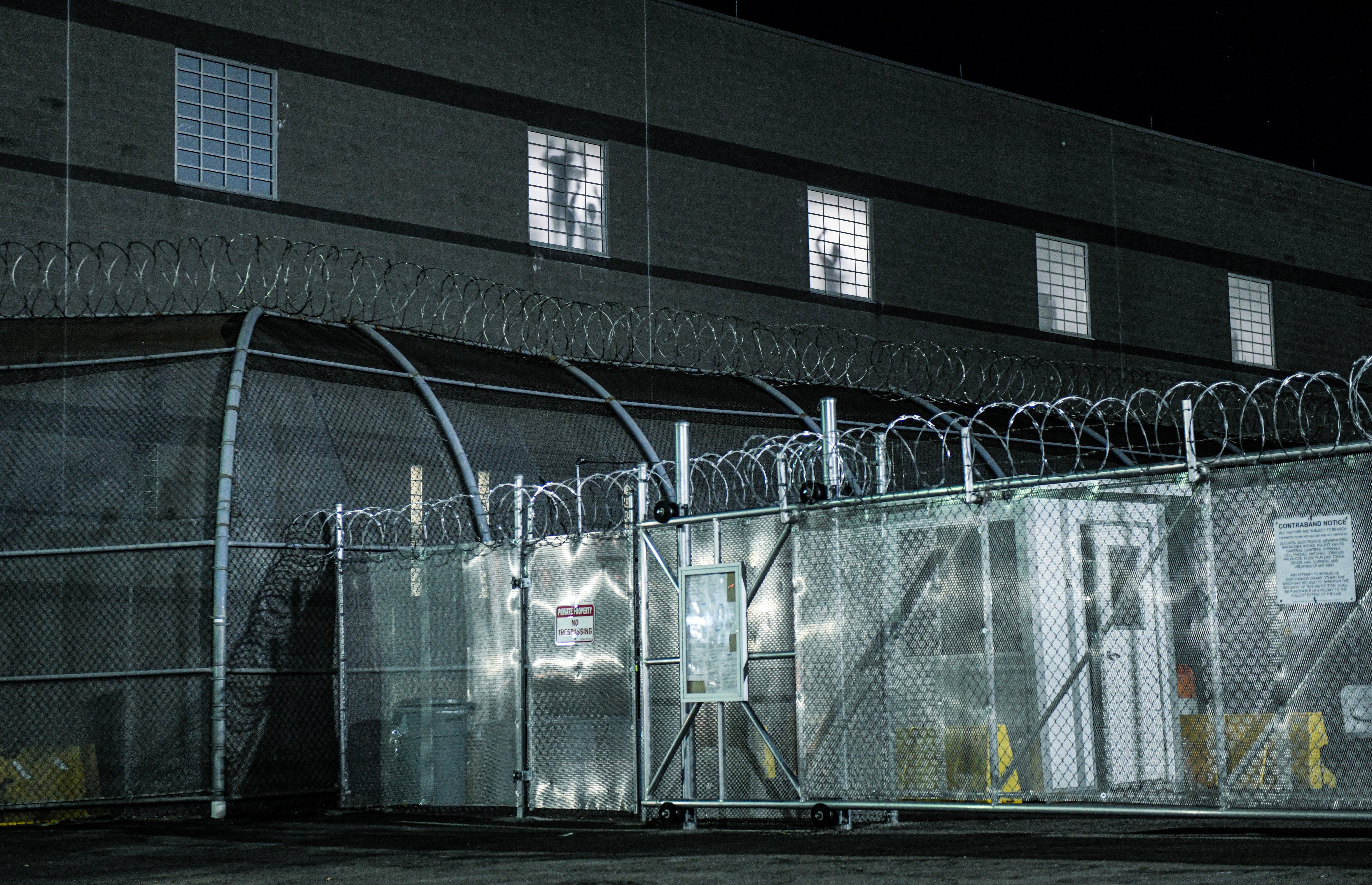 The silhouettes of detainees being held at Delaney Hall during a protest on May 30, 2026, in Newark, New Jersey.