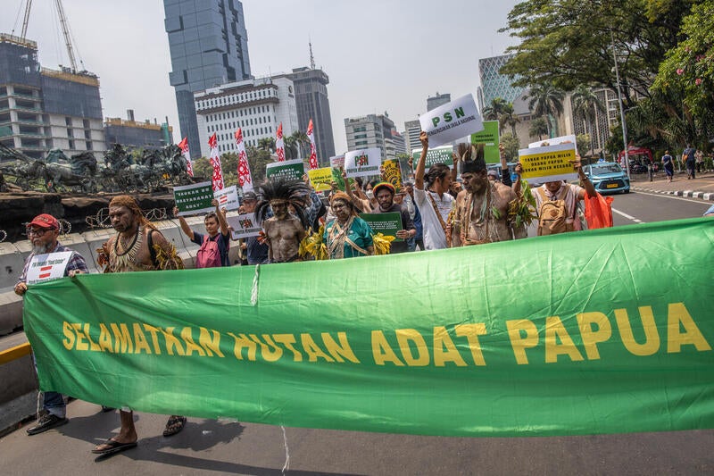 Representatives of the Merauke indigenous community with Yasinta Moiwend (center) protested in Jakarta against the large-scale rice field development project that threatens their land in Indonesia, 2025.