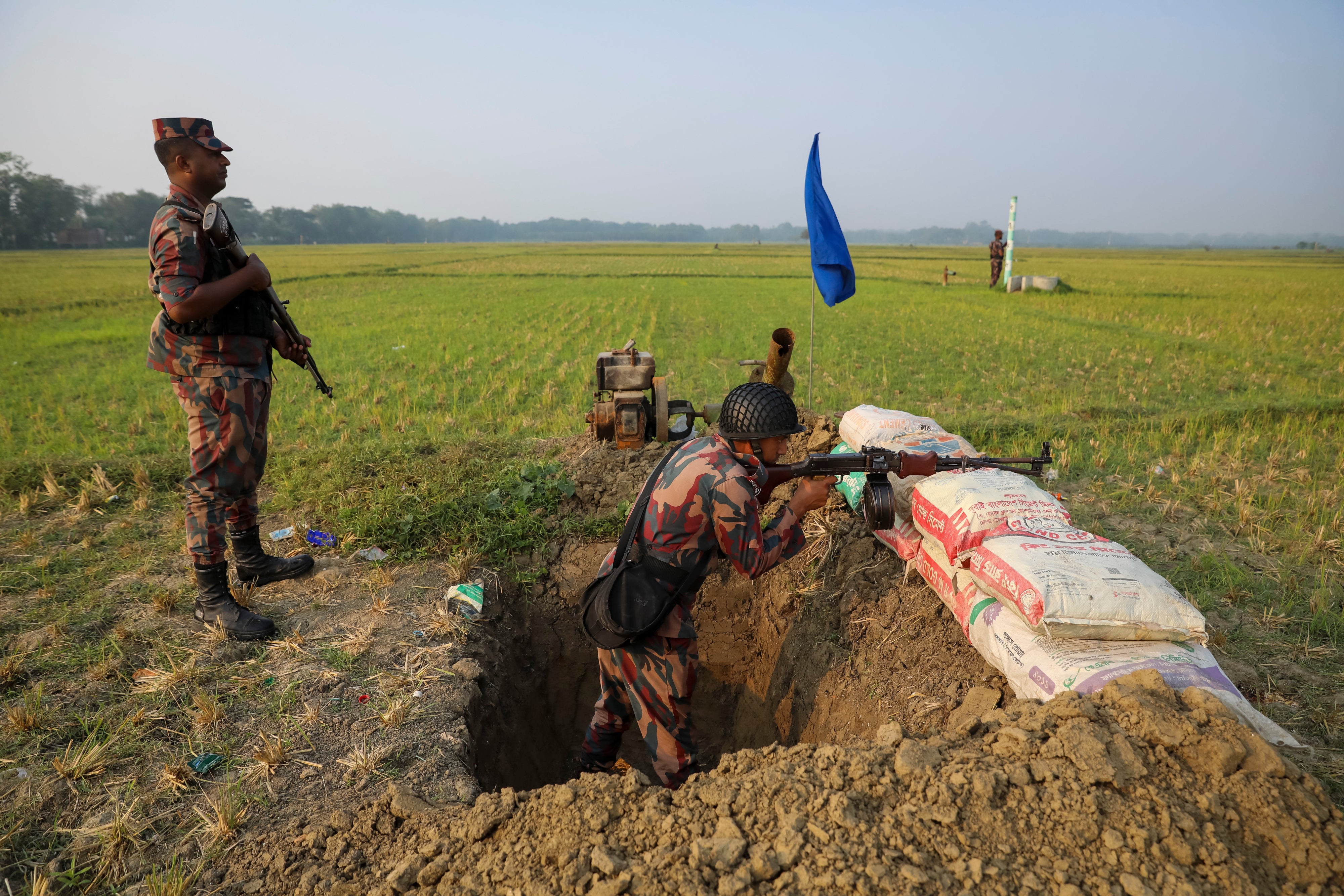 Border Guard Bangladesh personnel stand guard in the Sadipur border area in Benapole, Jessore district, Bangladesh, June 3, 2026. 