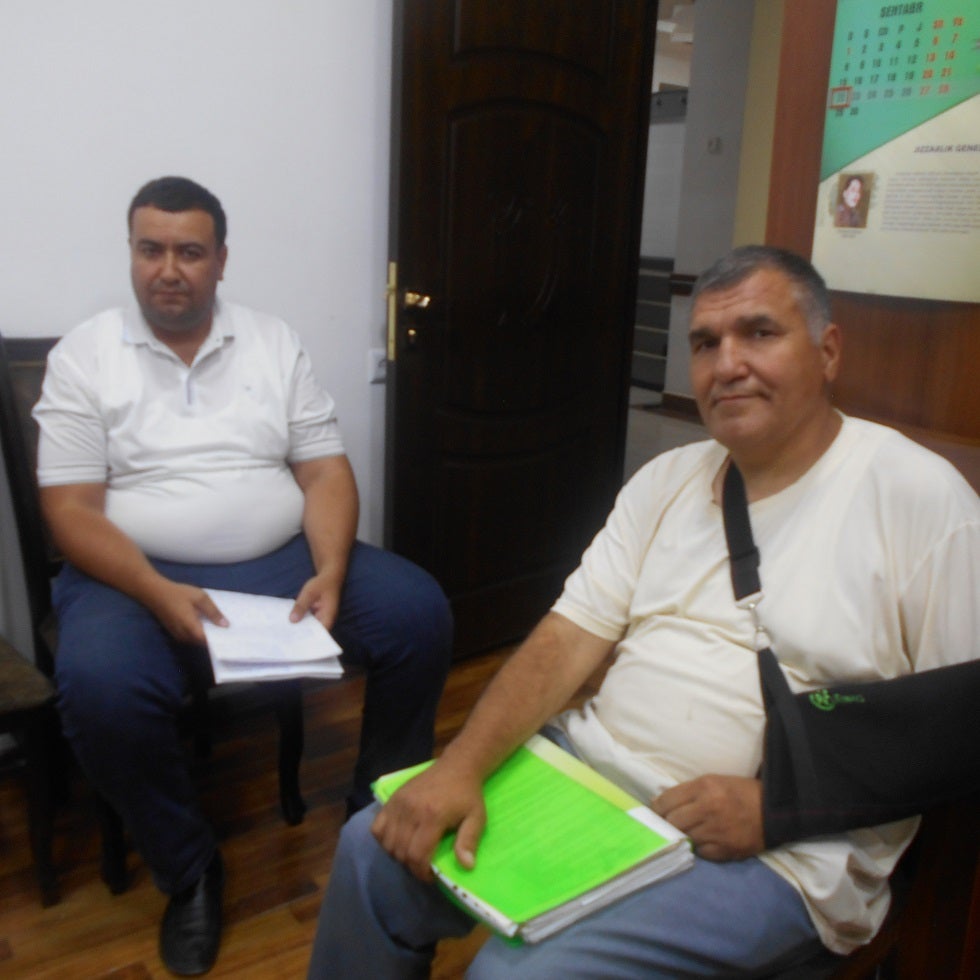 Javokhir Muminov (left) and Djura Akbarov (right) at the Kashkadarya Regional Prosecutor's Office. 