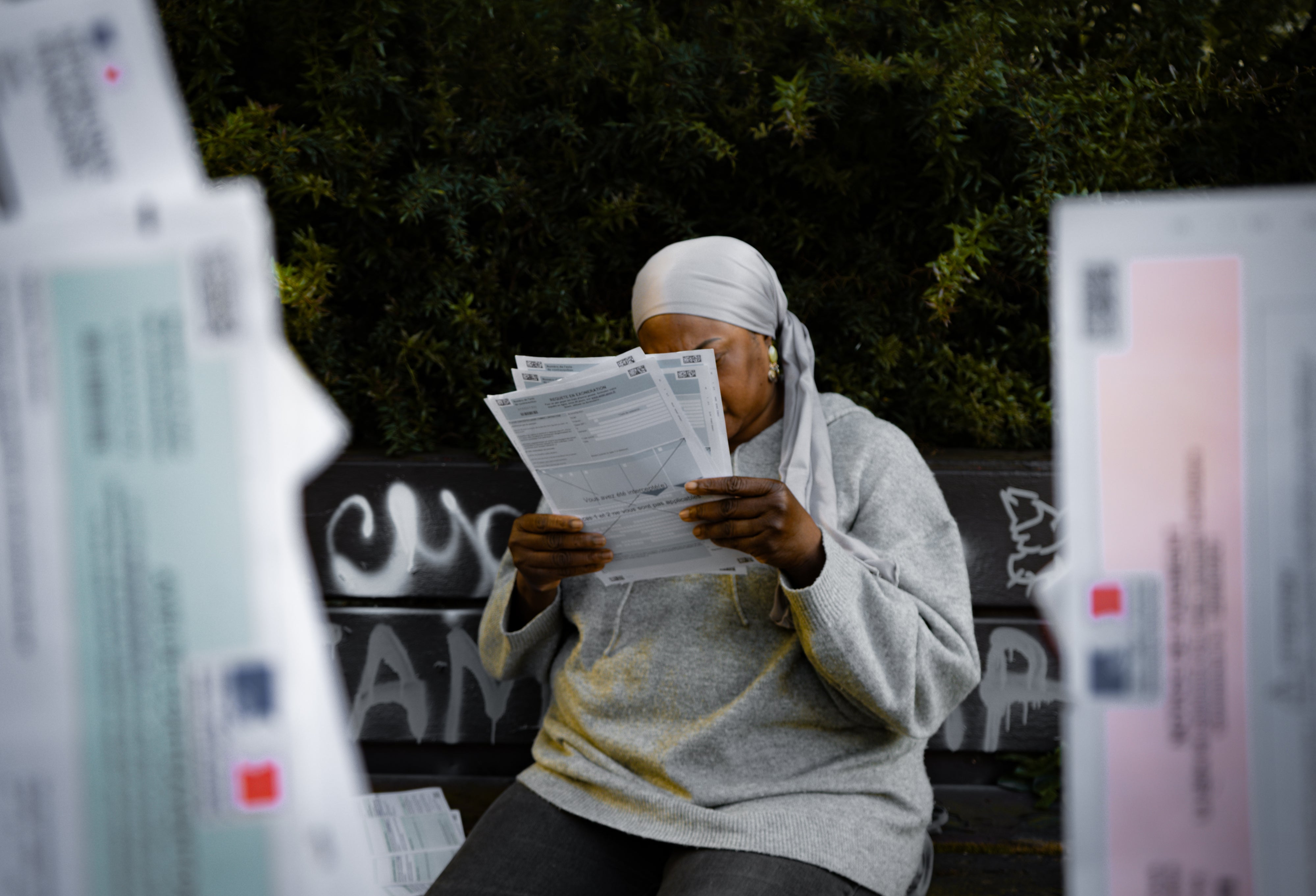 A mother faces her sons’ unpaid fine debt of tens of thousands of euros resulting from dozens of fines they received throughout their childhood, Paris, France, June 2026.