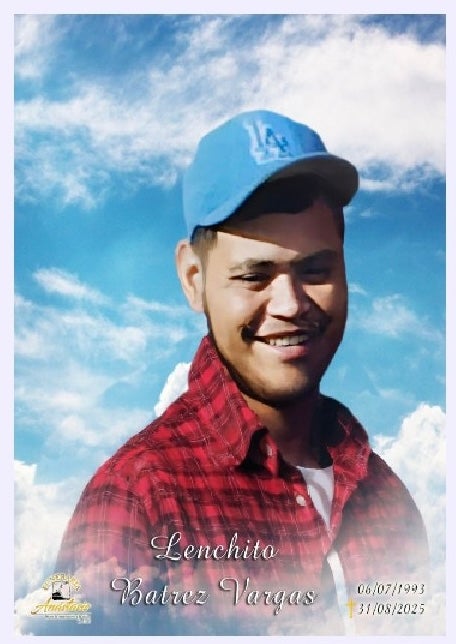 A man smiling in a photo