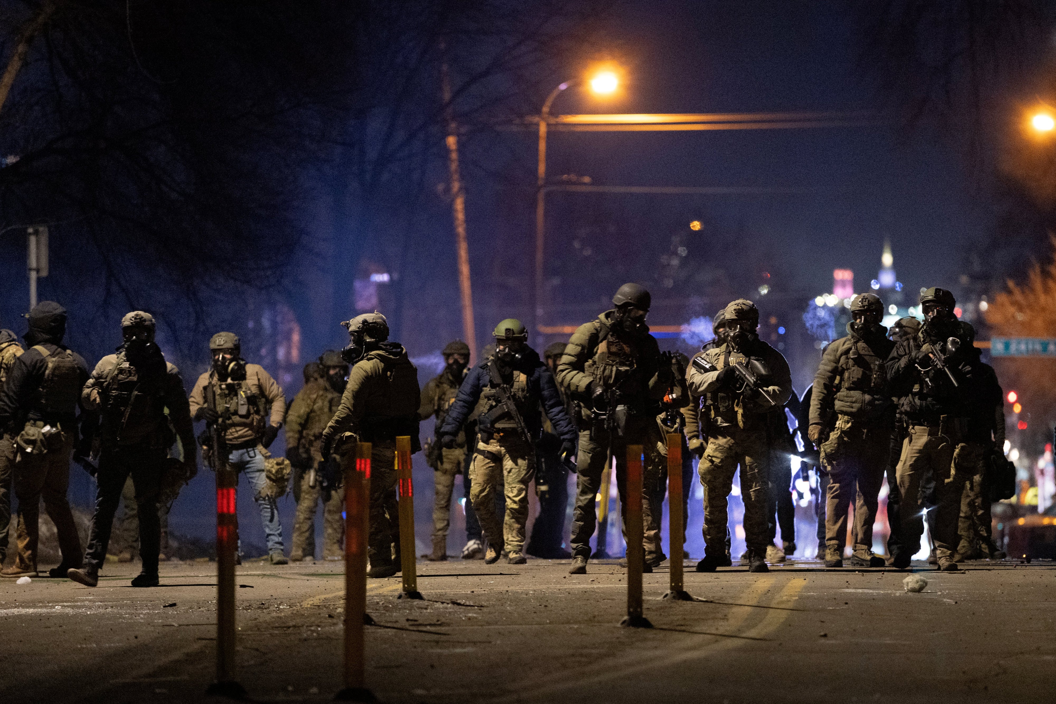Federal agents guard a perimeter