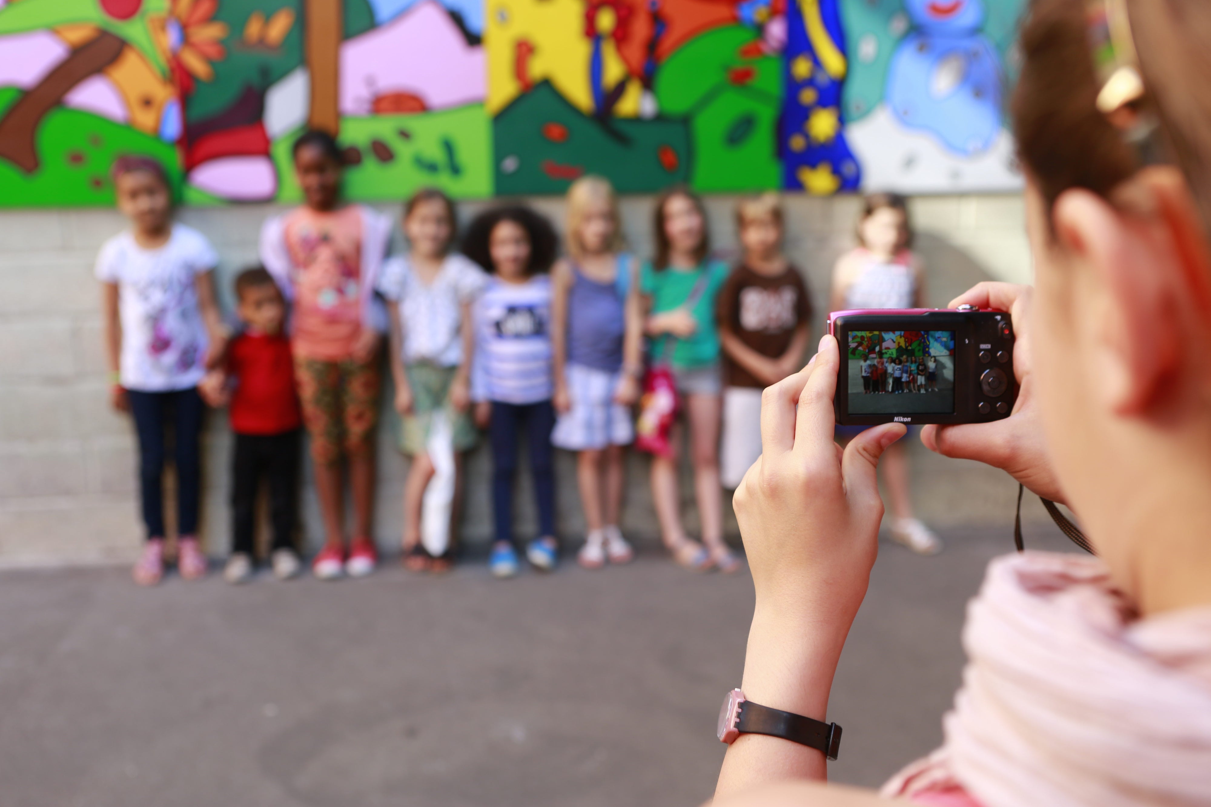 Students taking a group photo. 