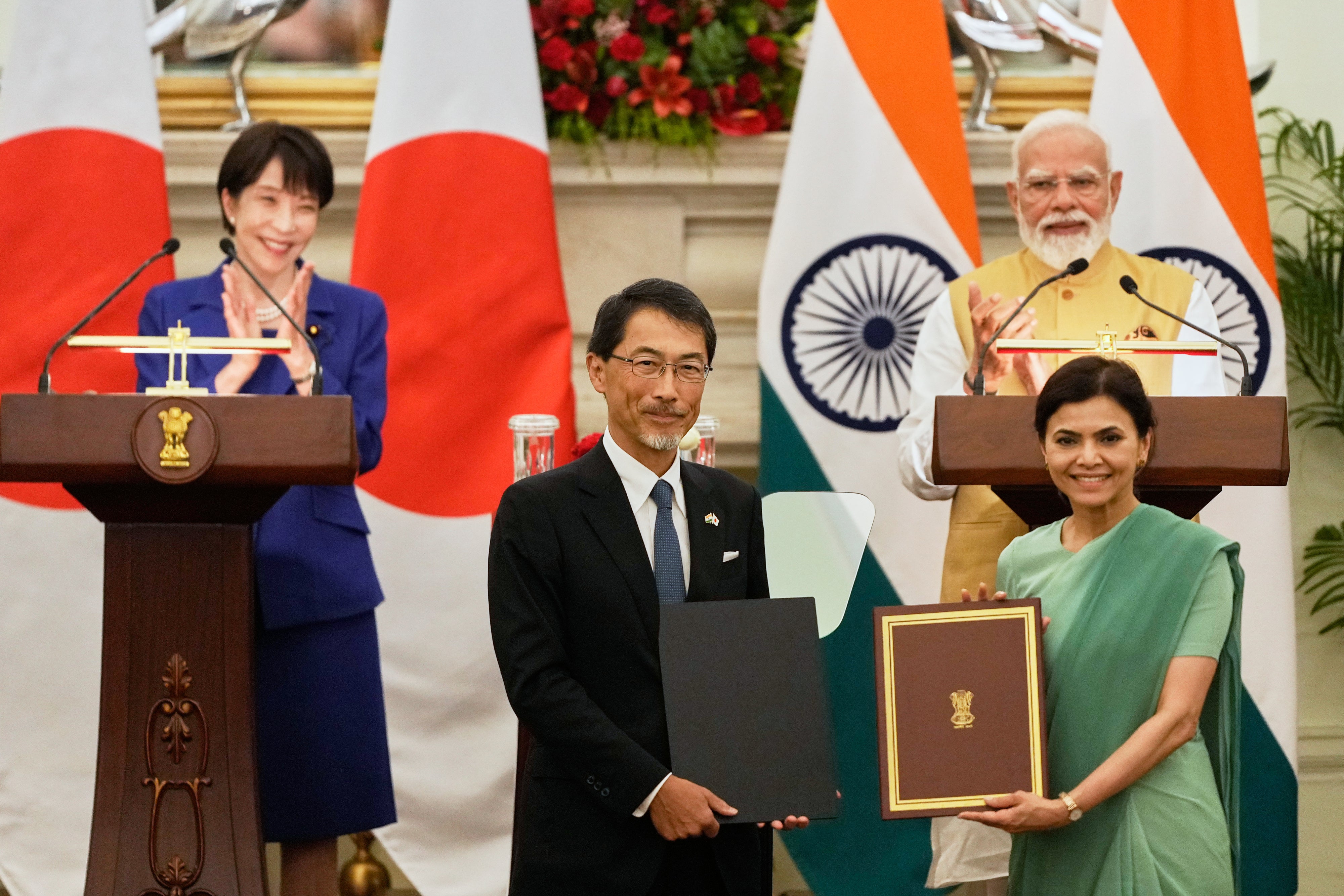 Left to right: Japan's Prime Minister Sanae Takaichi, Japan's ambassador to India Ono Kelichi, India's ambassador to Japan Nagma Mohamed Mallick, and India's Prime Minister Narendra Modi with a signed bilateral agreement after their delegation level meeting in New Delhi, India,  July 2, 2026.