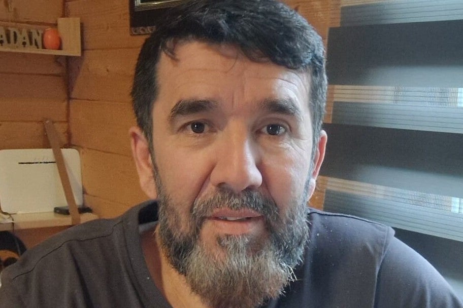 man smiling in a photo