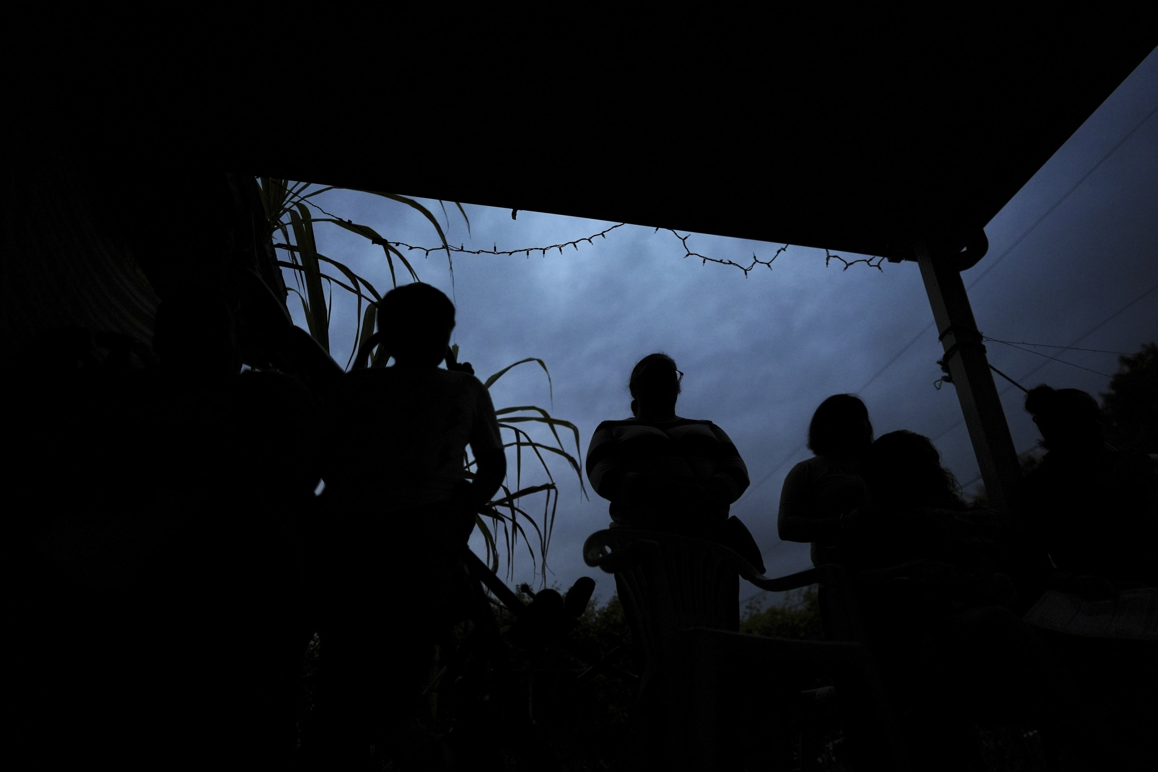 In Homestead, Florida, women and their children listen to an explanation of their legal rights and strategies for preparing their families if a parent is detained or deported,  January 17, 2025.