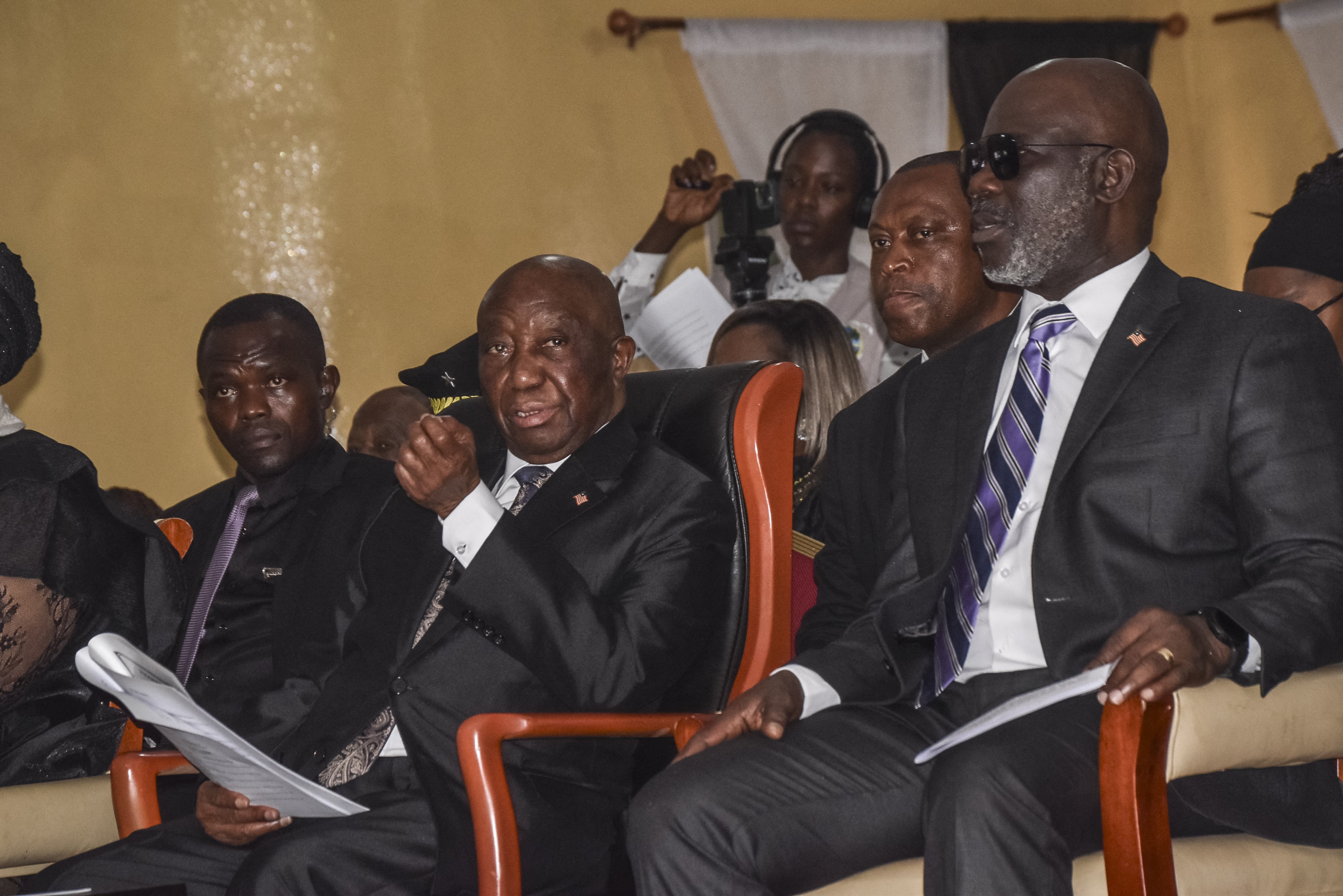 Liberian President Joseph Boakai (second from the left) and Liberian Speaker for the House of Representatives Richard Nagbe Koon (right) in Zwedru on June 27, 2025. 