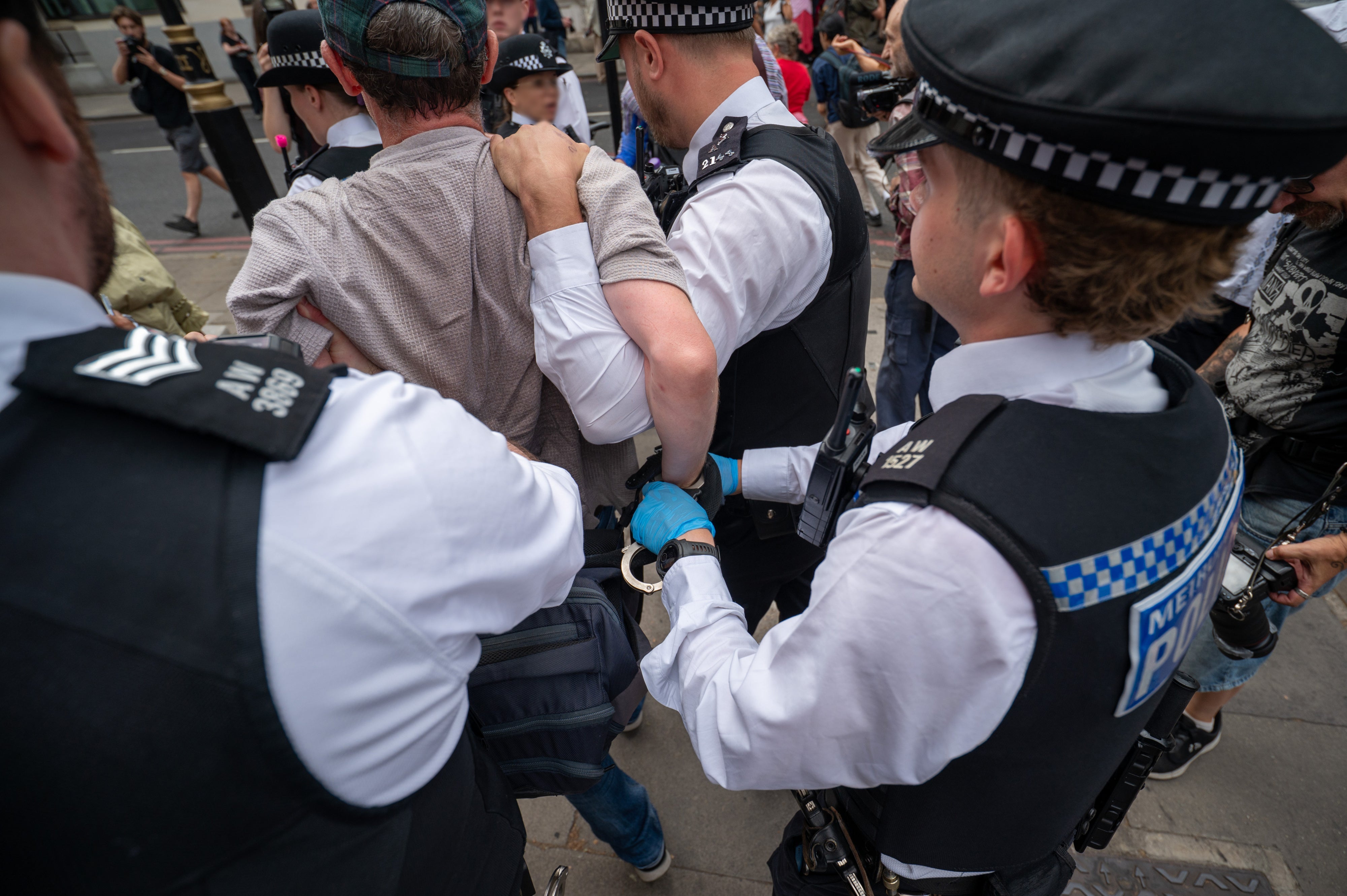 A person is detained during a Palestine Action demonstration at Marylebone Road in London, UK, July 30, 2026.