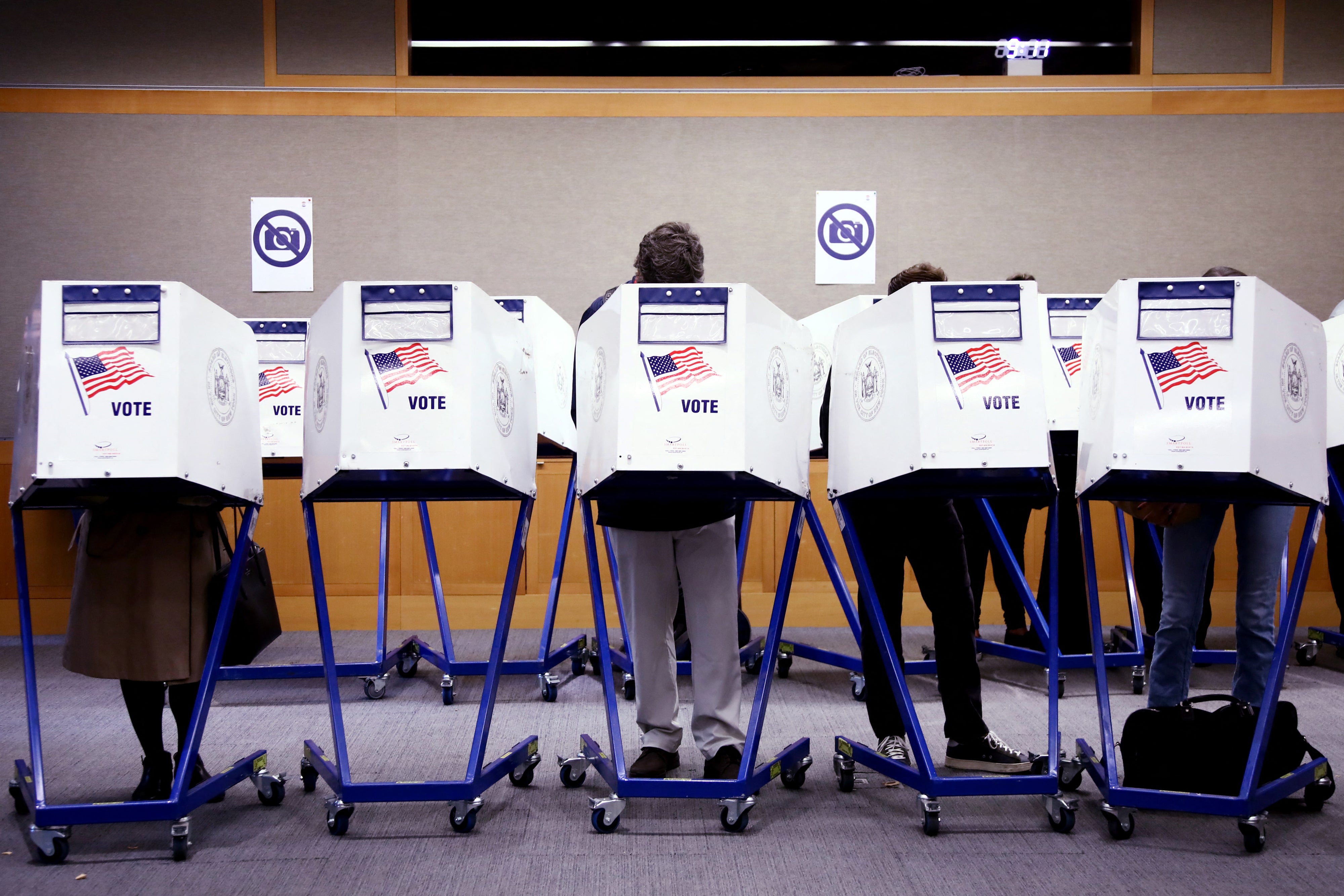 Voters fill out their ballots at a polling station in New York City on Election Day, November 5, 2024.