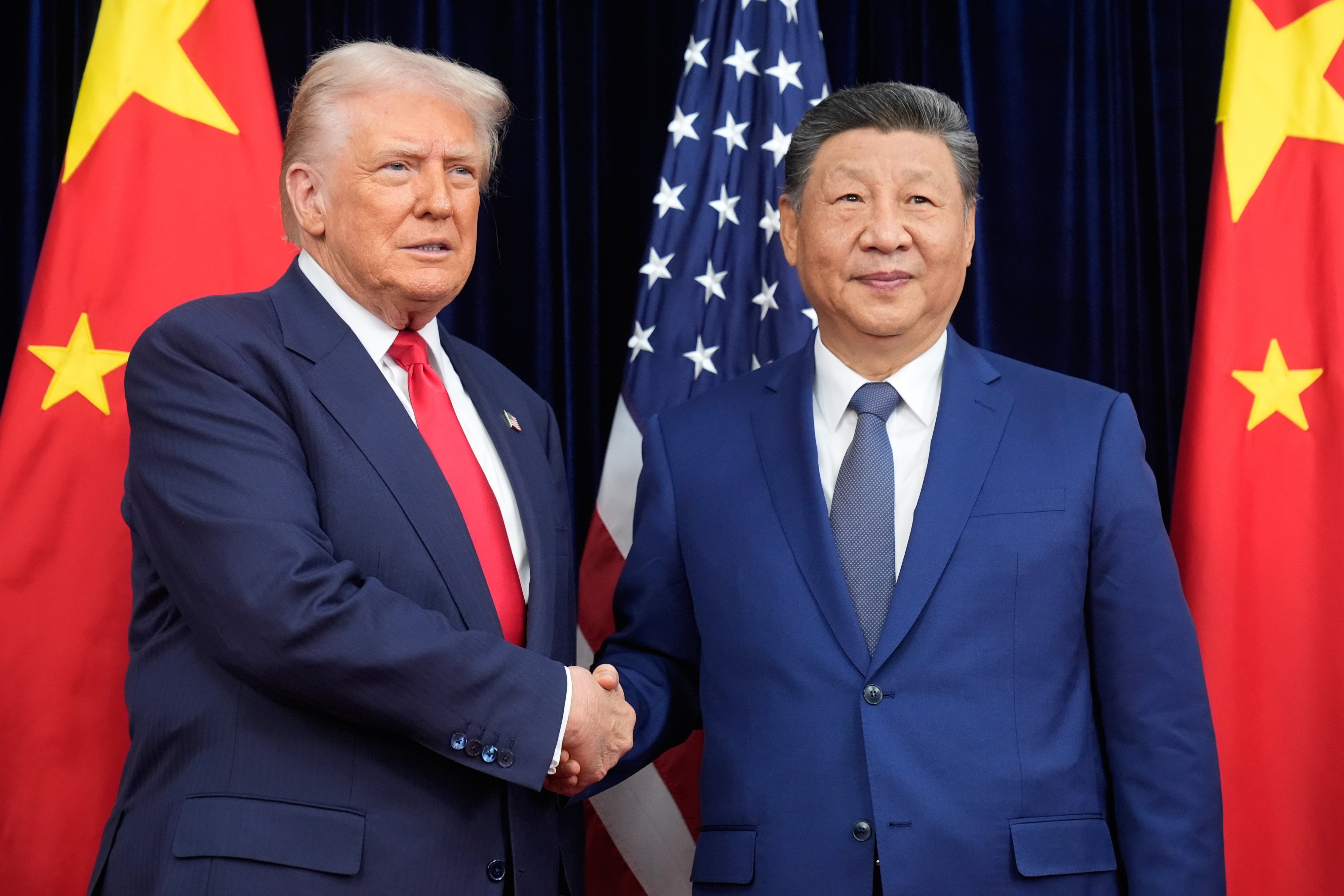 US President Donald Trump (left) and Chinese President Xi Jinping before their meeting at Gimhae International Airport in Busan, South Korea, October 30, 2025.