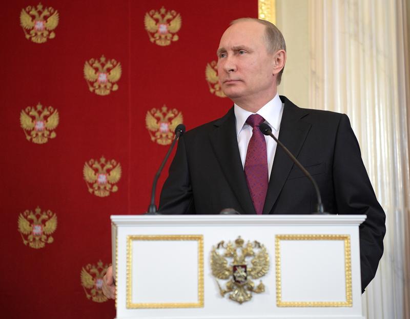 Russian President Vladimir Putin attends a joint news conference with Italian President Sergio Mattarella after their talks at the Kremlin in Moscow, Russia April 11, 2017.