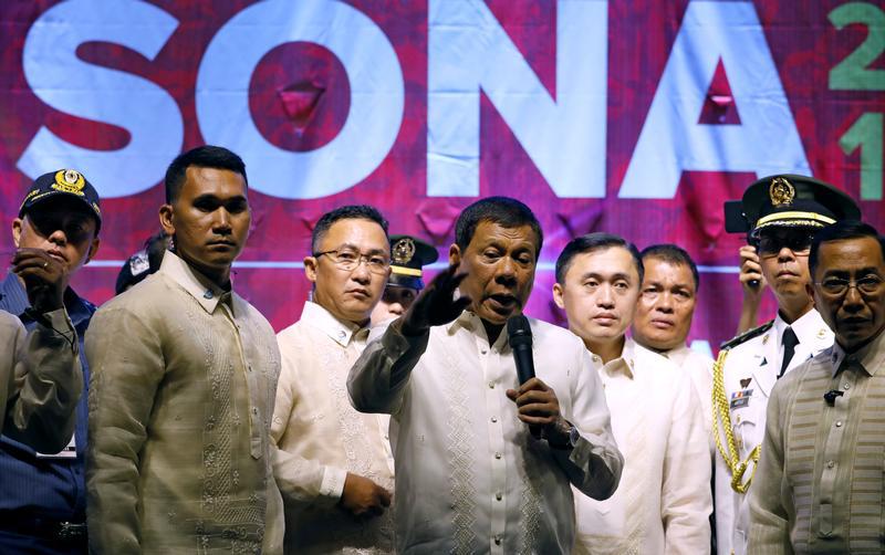 Philippine President Rodrigo Duterte speaks to protesters after he delivered his State of the Nation address at the Congress in Quezon city, Metro Manila Philippines July 24, 2017.