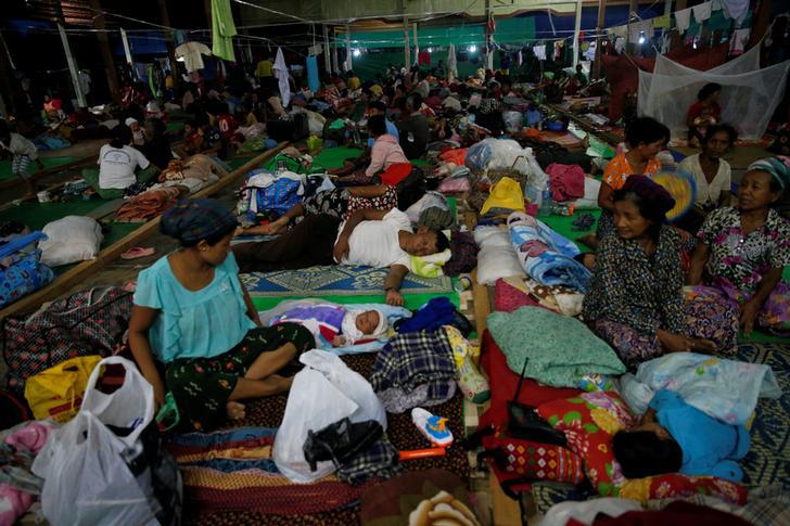 People displaced in the conflict between Kachin Independence Army (KIA) and Myanmar military for the control of an amber mine pass their time at a Christian church in Tanai township, Kachin state, Myanmar June 16, 2017. 