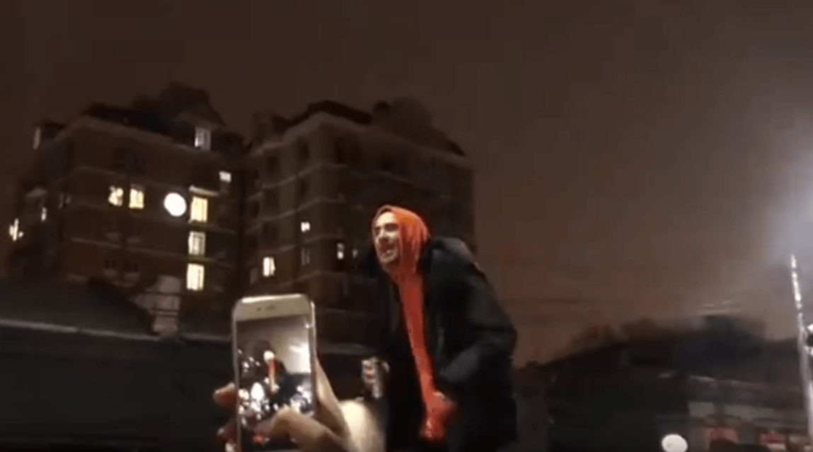 Husky singing to his fans from the top of a car. Krasnodar, 2018. 