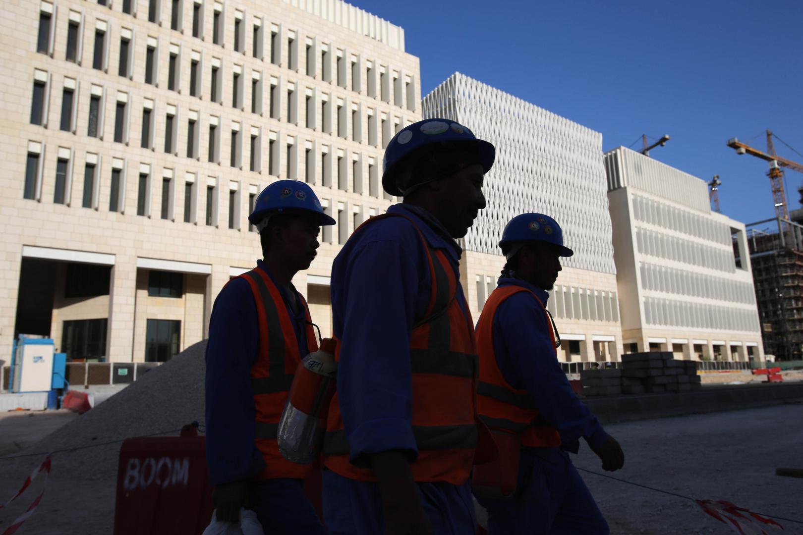 Workers leave their construction sites