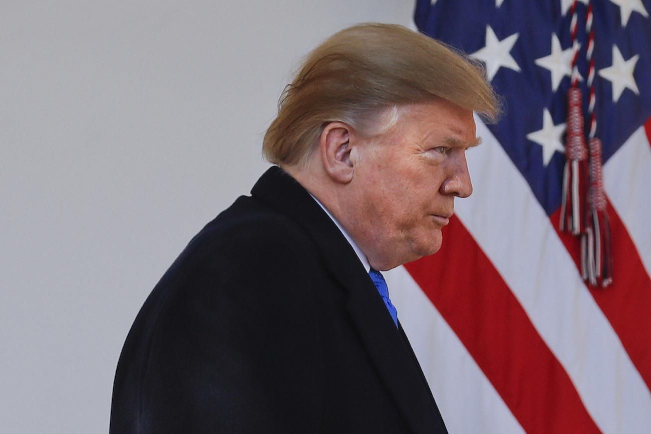 President Donald Trump walks out to begin speaking at an event in the Rose Garden at the White House to declare a national emergency in order to build a wall along the southern border