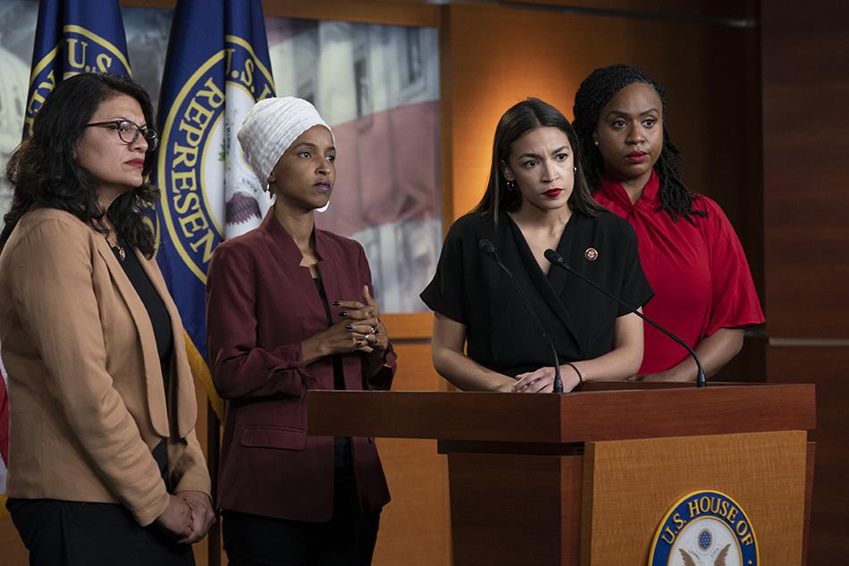 From left, Rep. Rashida Tlaib, D-Mich., Rep. Ilhan Omar, D-Minn., Rep. Alexandria Ocasio-Cortez, D-N.Y., and Rep. Ayanna Pressley, D-Mass., respond to remarks by President Donald Trump after his call for the four Democratic congresswomen to go back to the