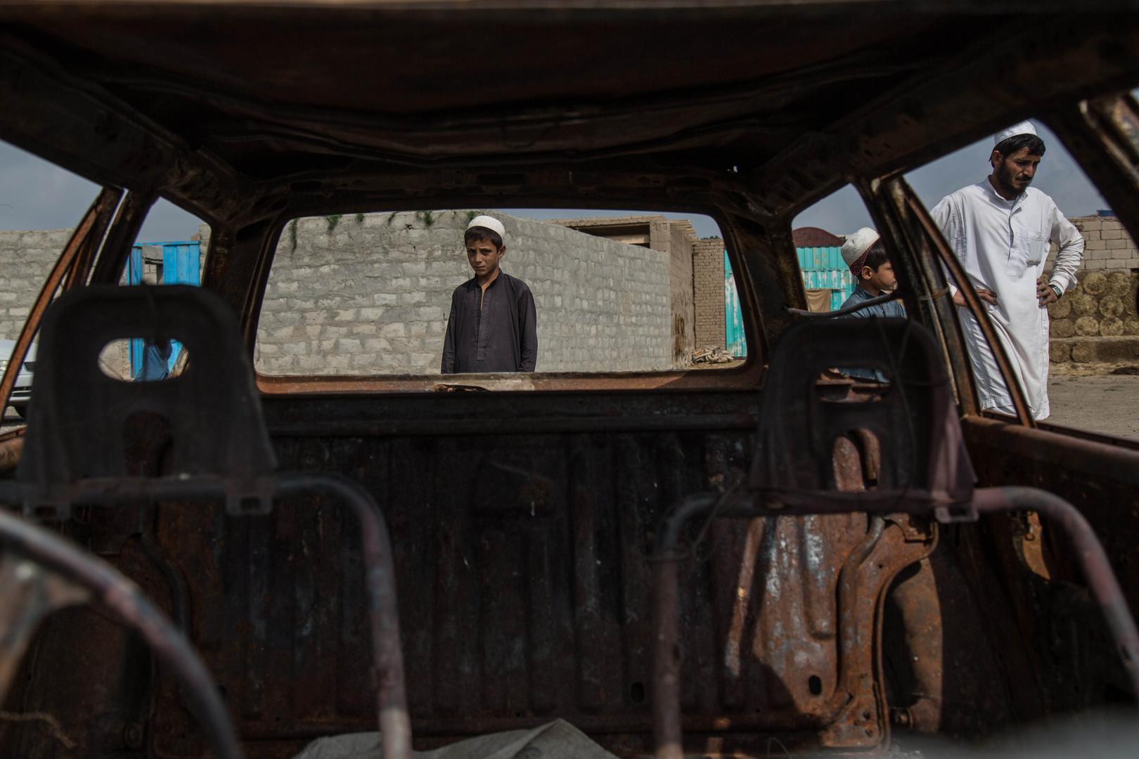 A car burned during a raid by the Khost Protection Force in Tani district, Khost province, Afghanistan, July 28, 2019.