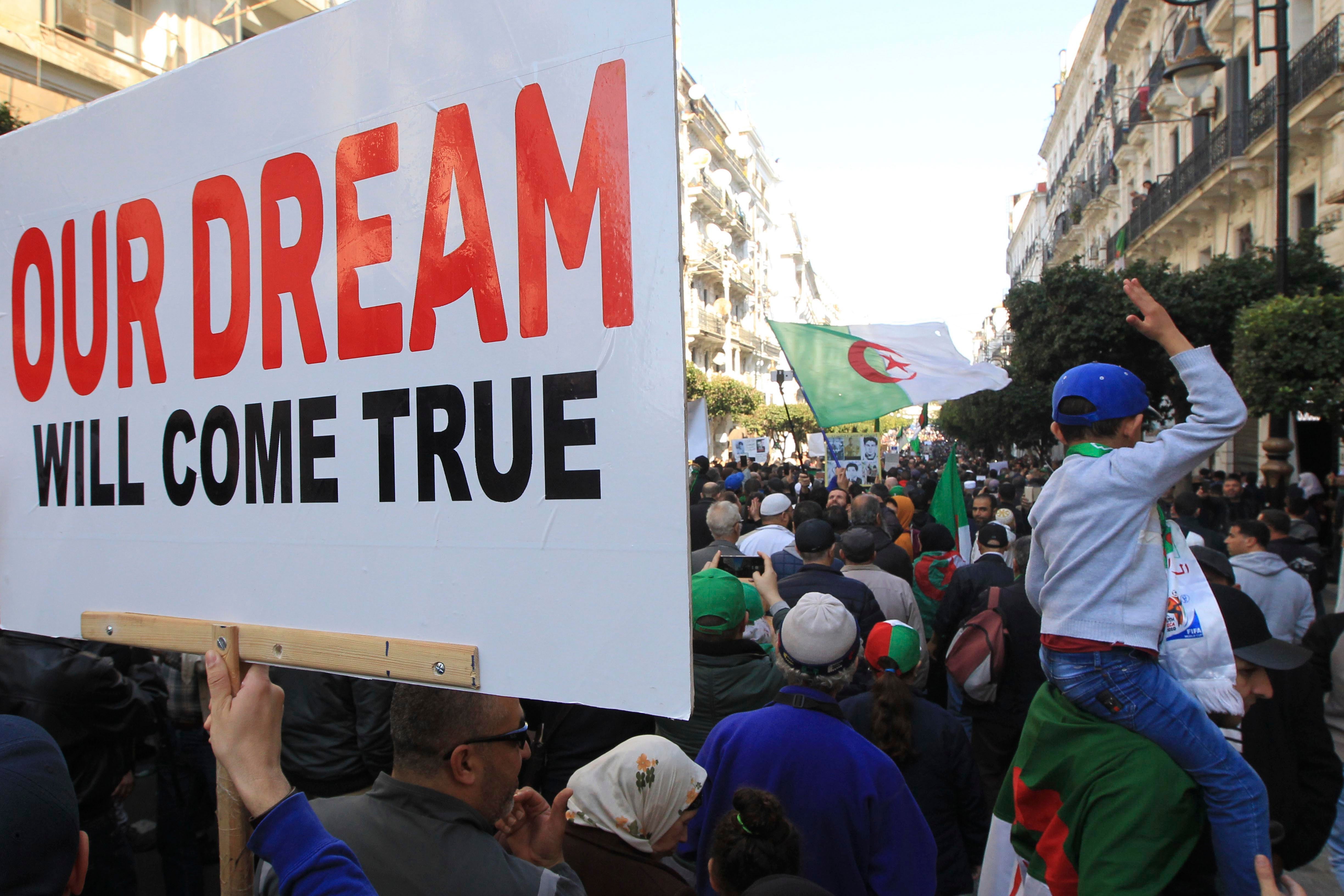 Algerians demonstrate to protest against the government, in Algiers Friday, Jan.3, 2020.