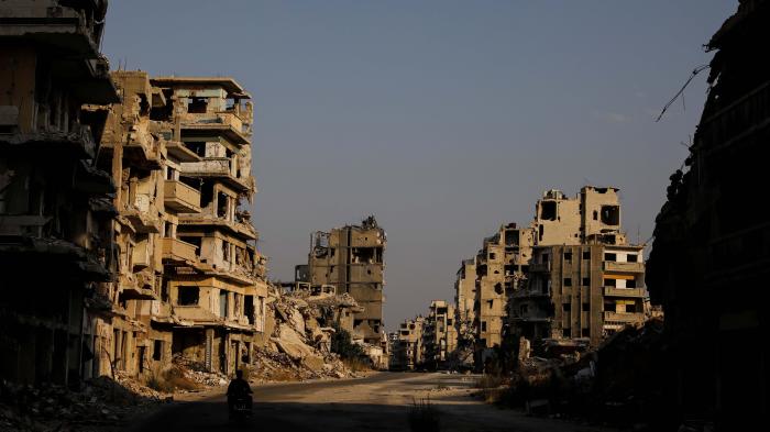 A streetview of destroyed buildings in a city