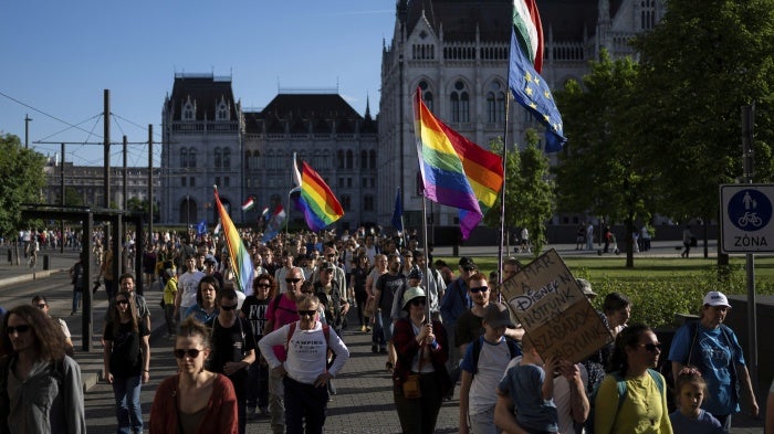 Hungarians march in downtown Budapest to protest against the previous government’s law banning LGBTQ+ Pride events, May 1, 2025.