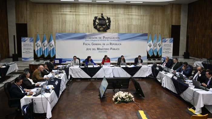 Members of the Nominating Commission review the files of candidates for attorney general of the Republic and head of the Public Prosecutor's Office at the Palace of Justice in Guatemala City on April 17, 2026. 