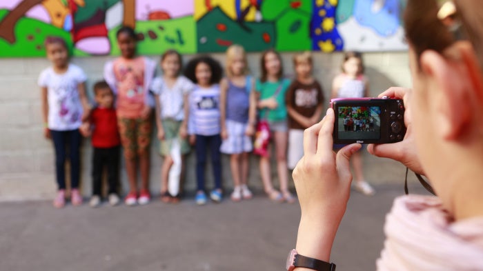 Students taking a group photo. 