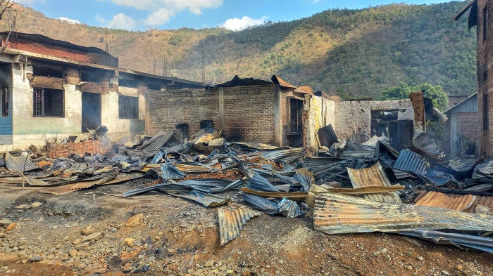 Charred remains of a building following a violent clash between the Tangkhul Naga and Kuki tribes at Litan village, in Ukhrul, Manipur, India, February 10, 2026. 