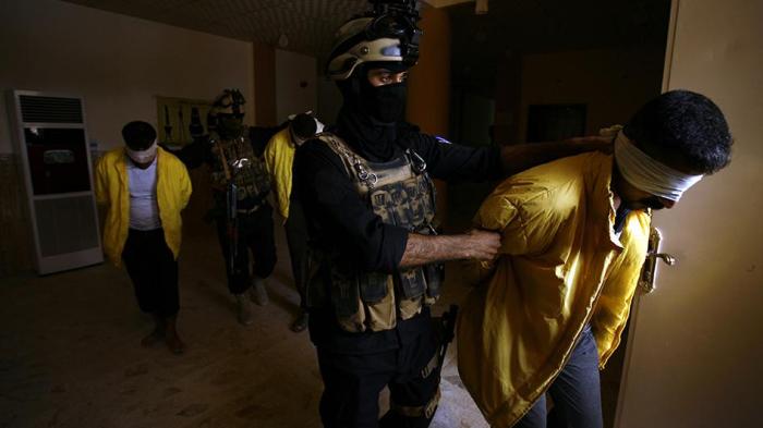 Iraqi Military hold ISIS suspects
