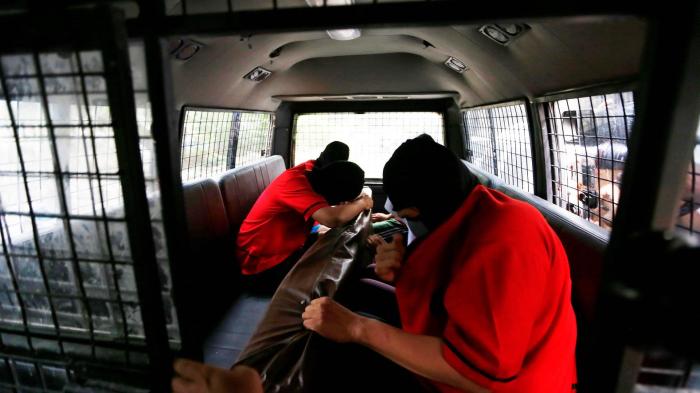 Some of the 51 men, including foreign nationals, arrested during a police raid on what they described as a “gay spa” in Jakarta on October 6, 2017.