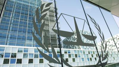 A picture of the ICC logo on a glass wall.