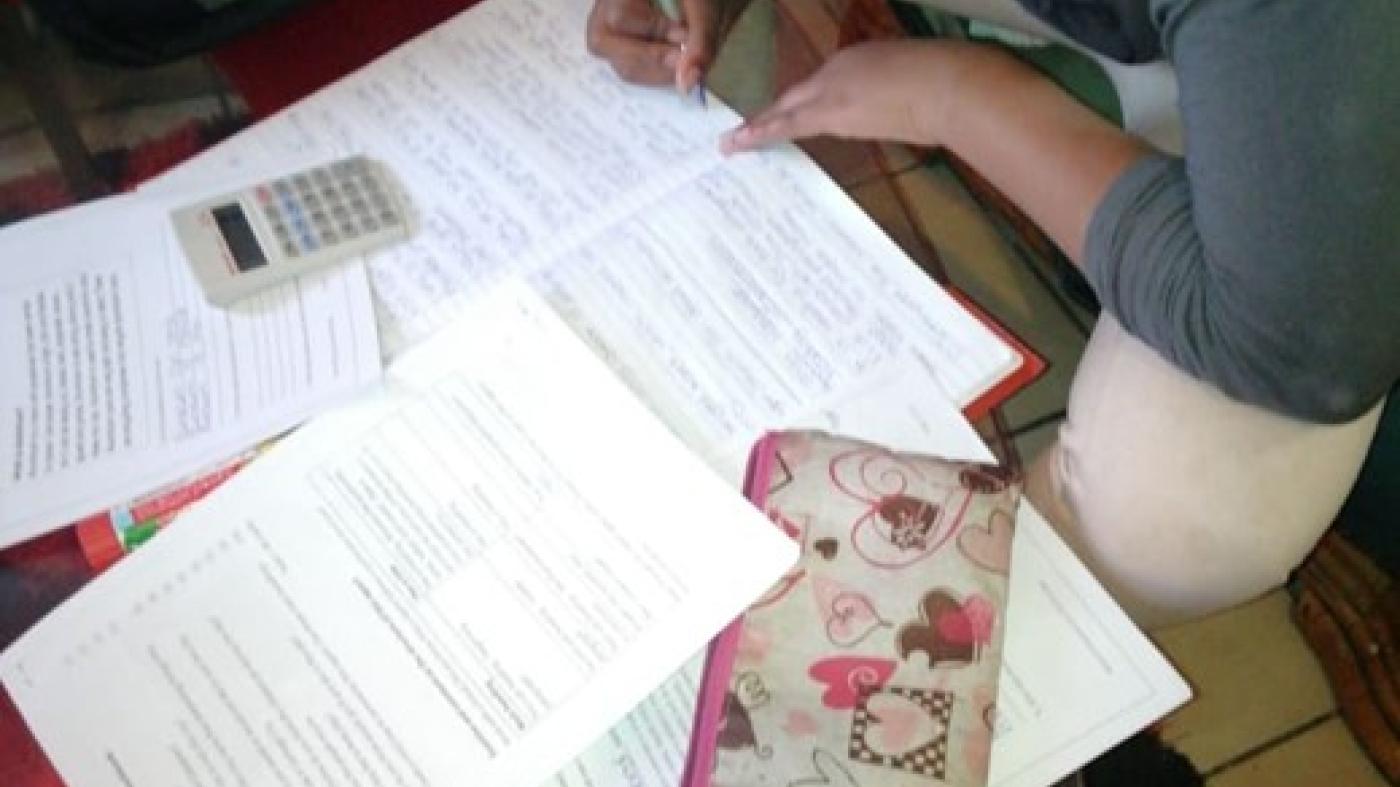 Keshia completes her homework in her family’s home in Johannesburg in August 2020. ©2020 Private
