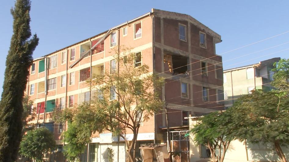 Damage to wall of an apartment building in Shire, Tigray region.