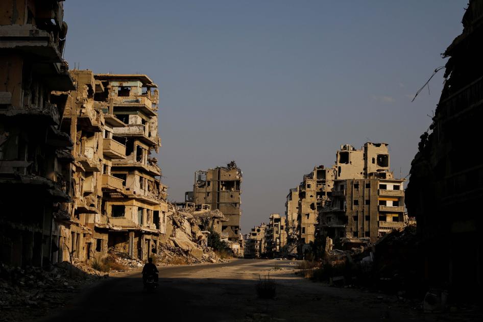 A streetview of destroyed buildings in a city
